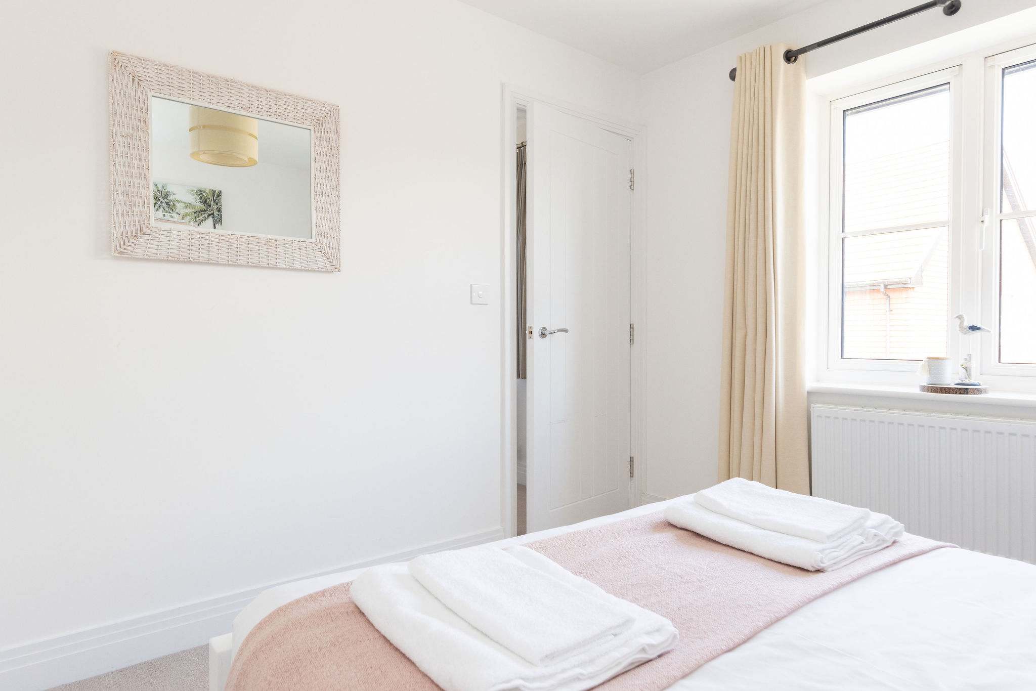 Your serene retreat, with a comfortable double bed and soft, fresh linens.