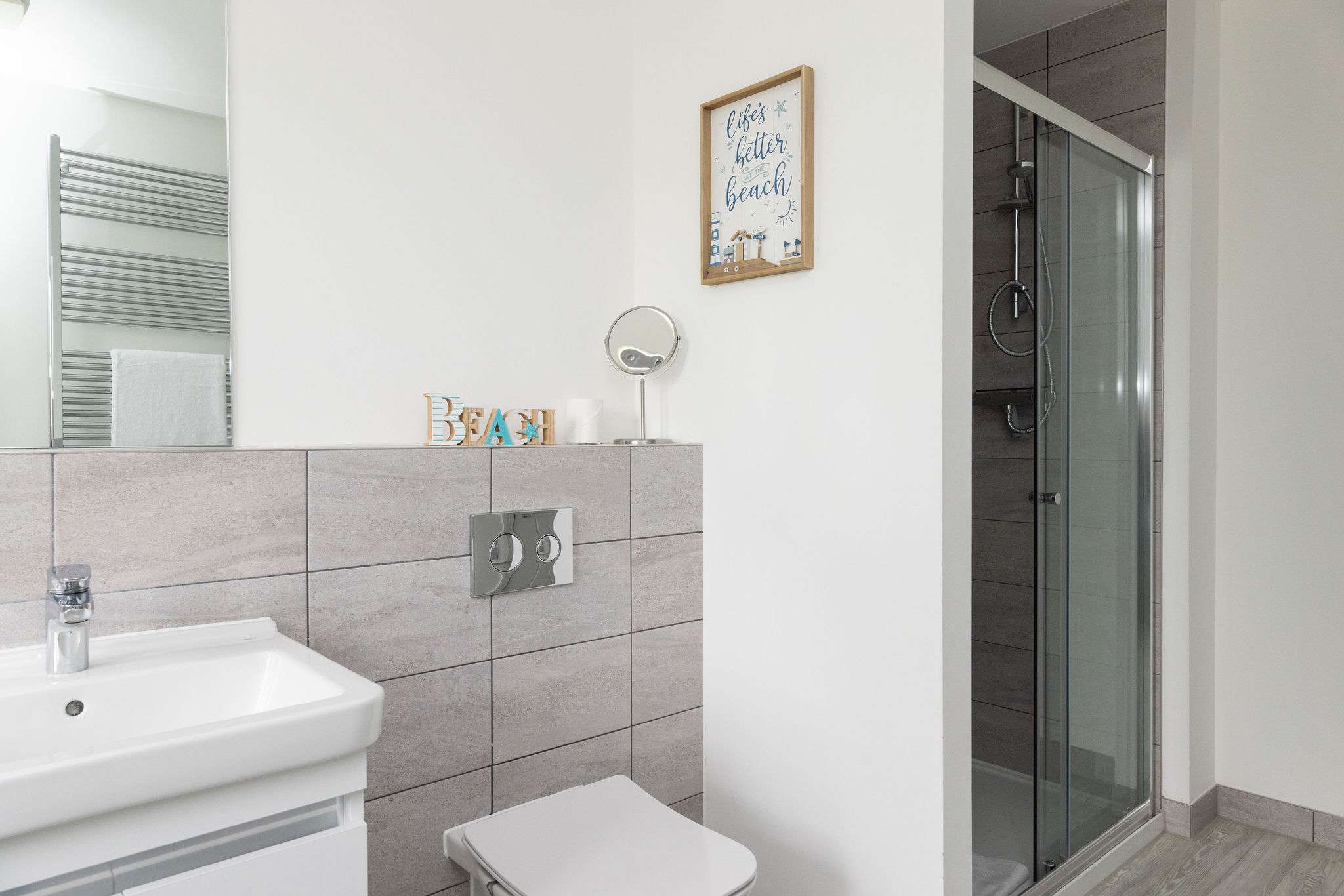 Freshen up in the spacious walk-in shower.