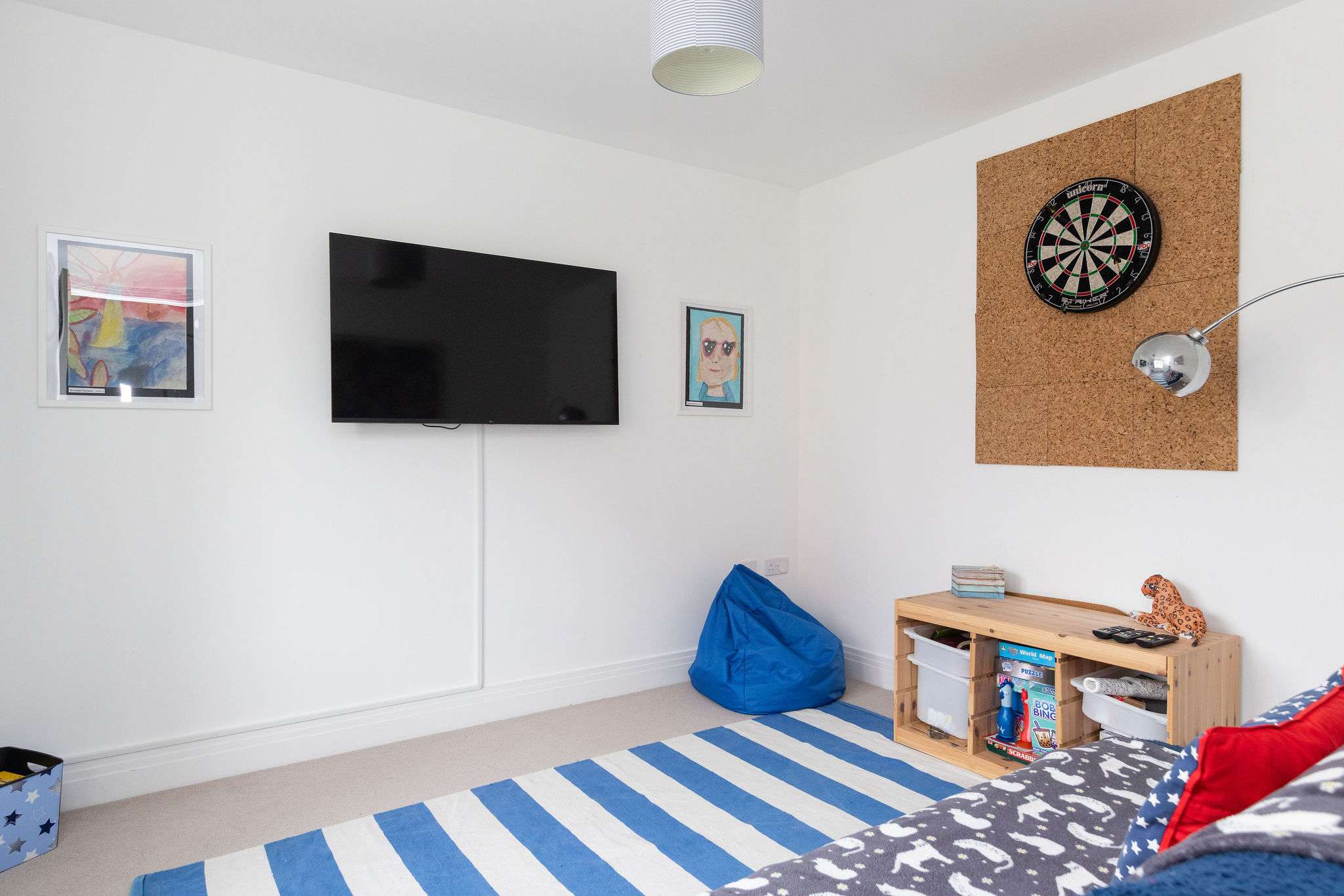 The ultimate kids' and teens' den, complete with a TV for movie nights.