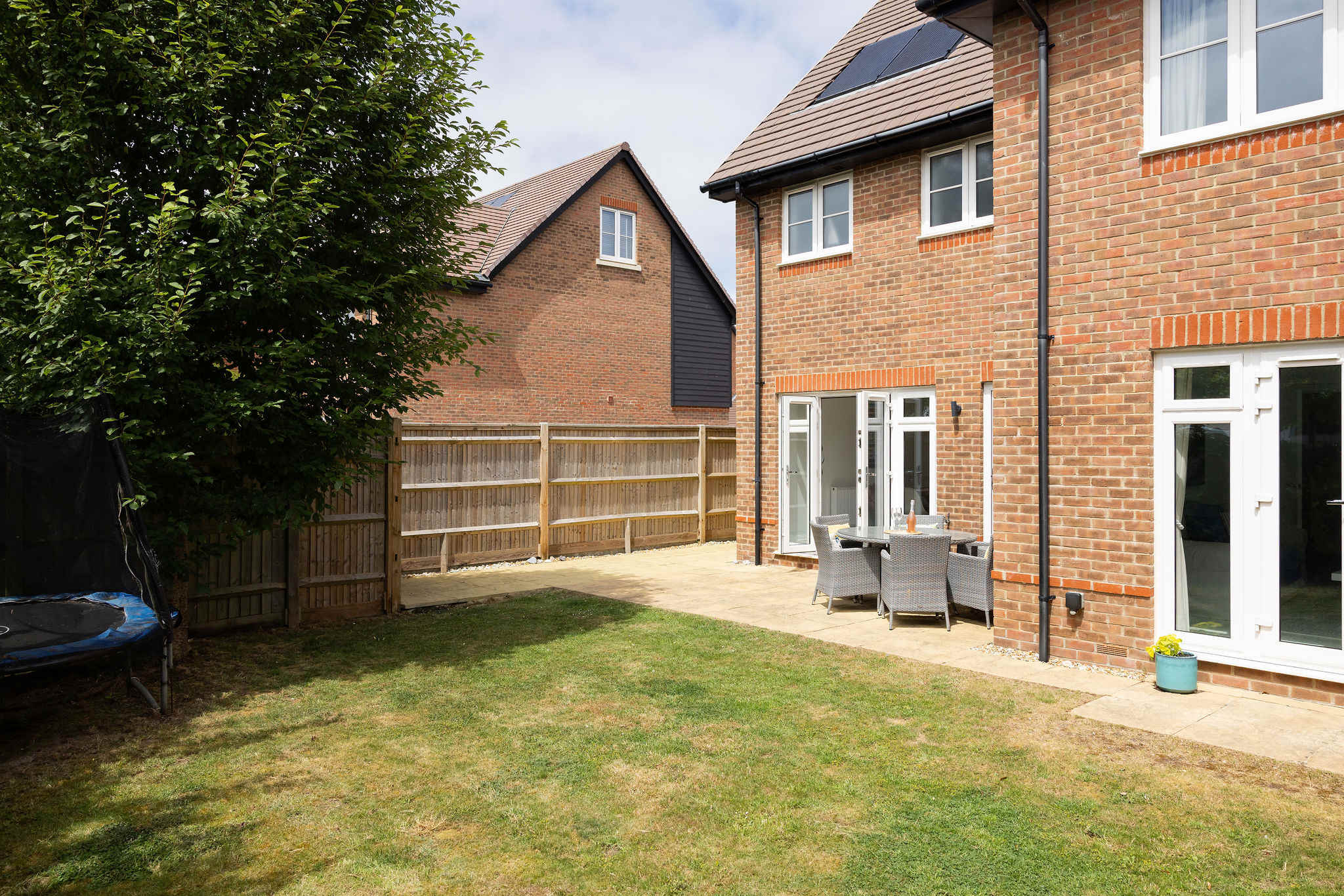 Our fully fenced garden. A safe and private space for children to play on the lawn.