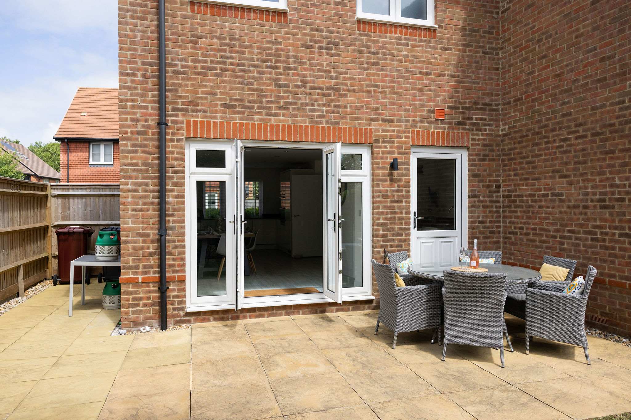 Step out from the dining room onto the patio, perfect for alfresco meals and evening drinks.