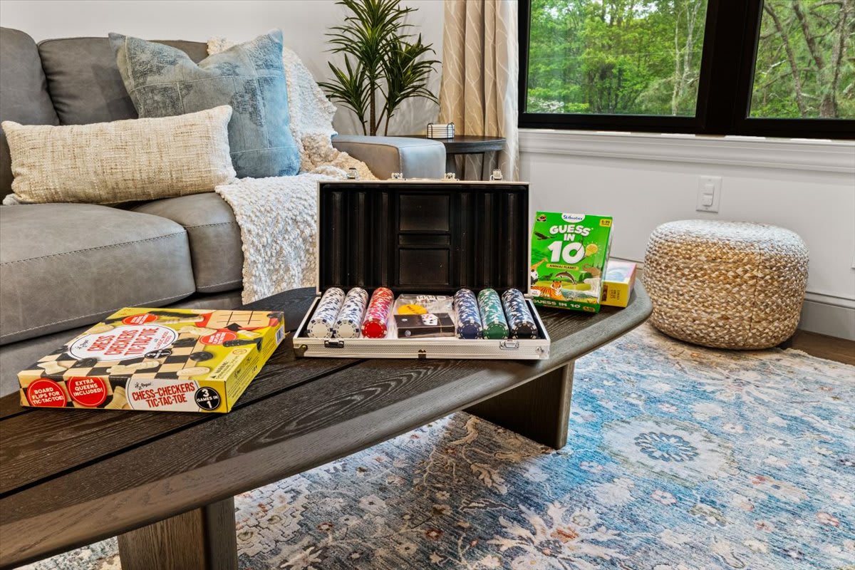 Gather on the cozy couch with family after a day of fun in the game room.