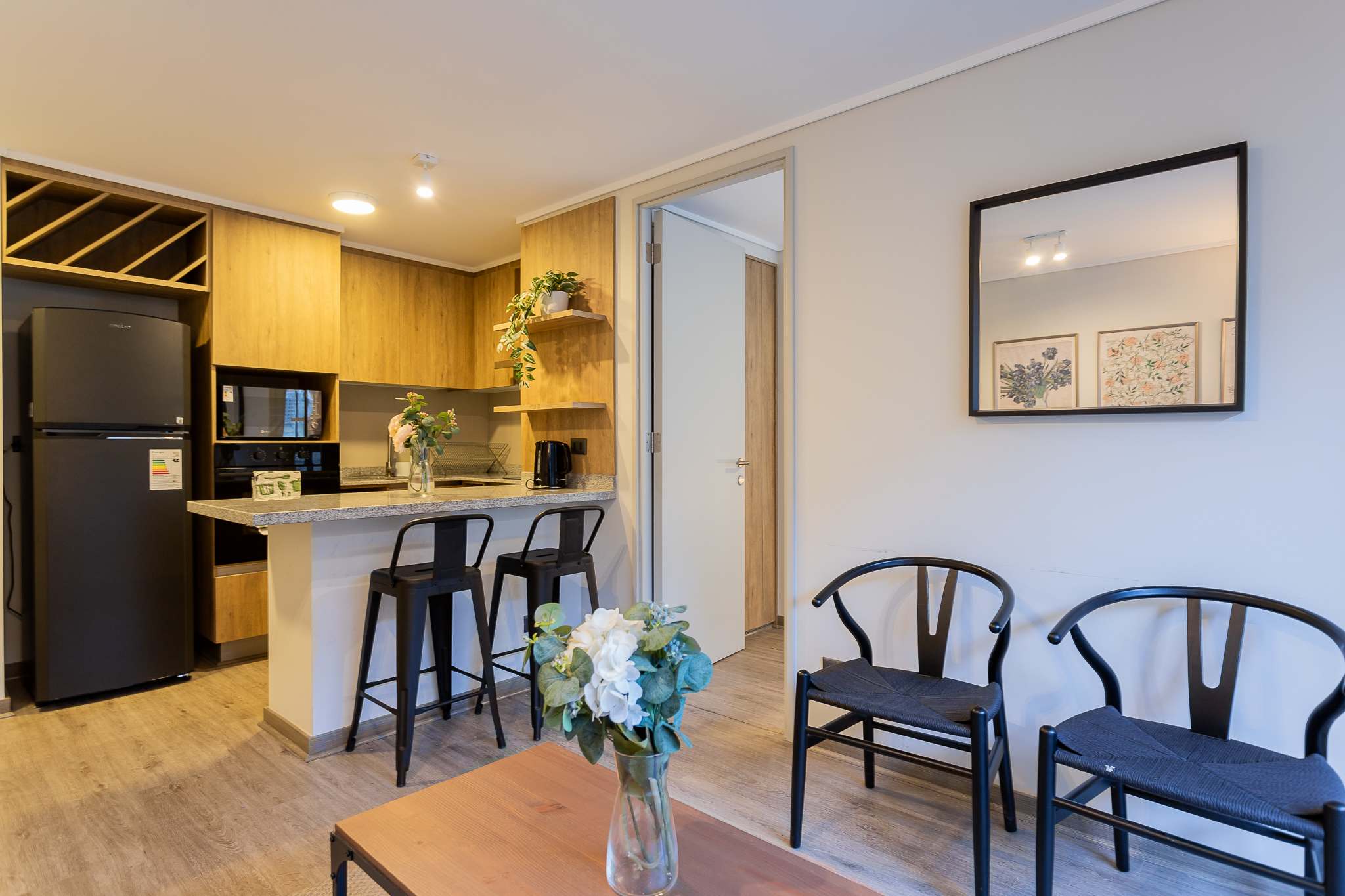 Cozy and stylish kitchen with modern amenities, perfect for enjoying a meal or a quick snack.