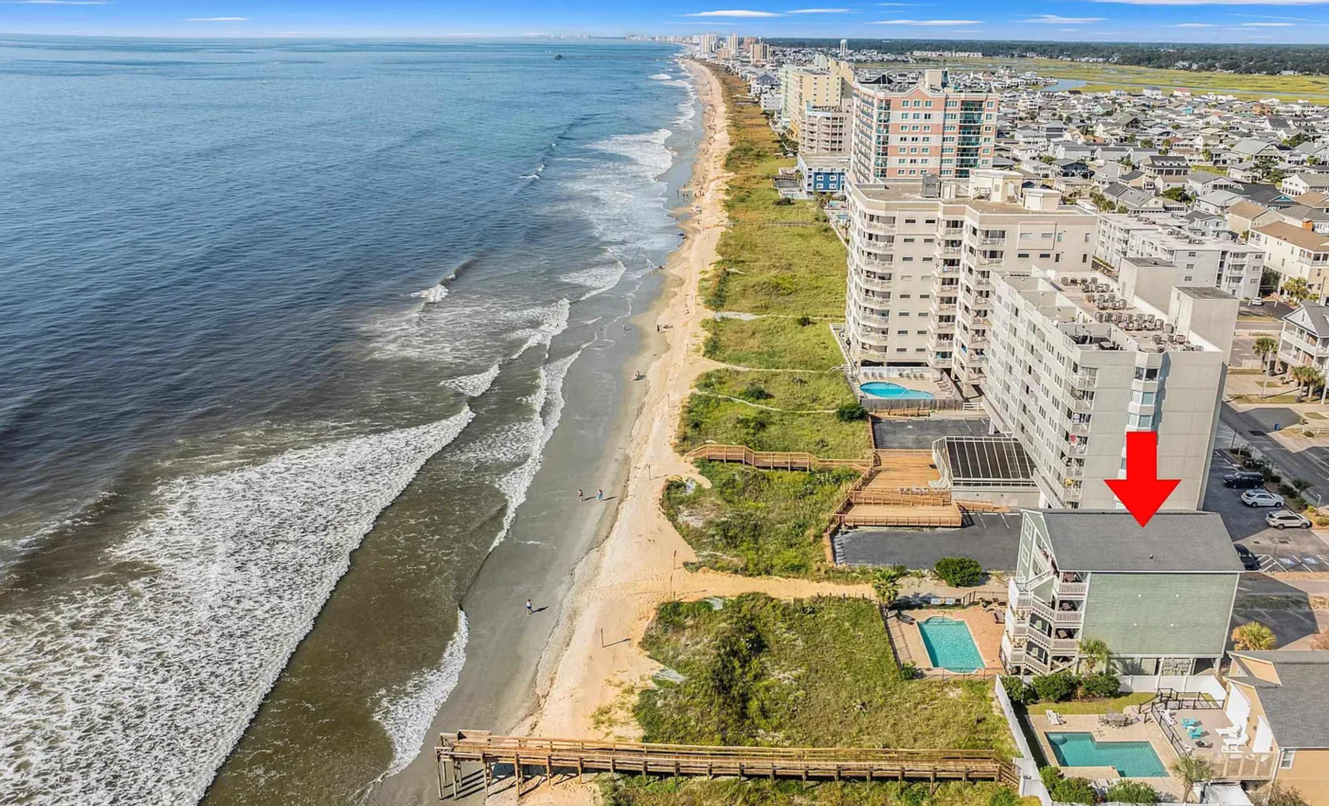 A coastal gem just steps from the sand and sea.
