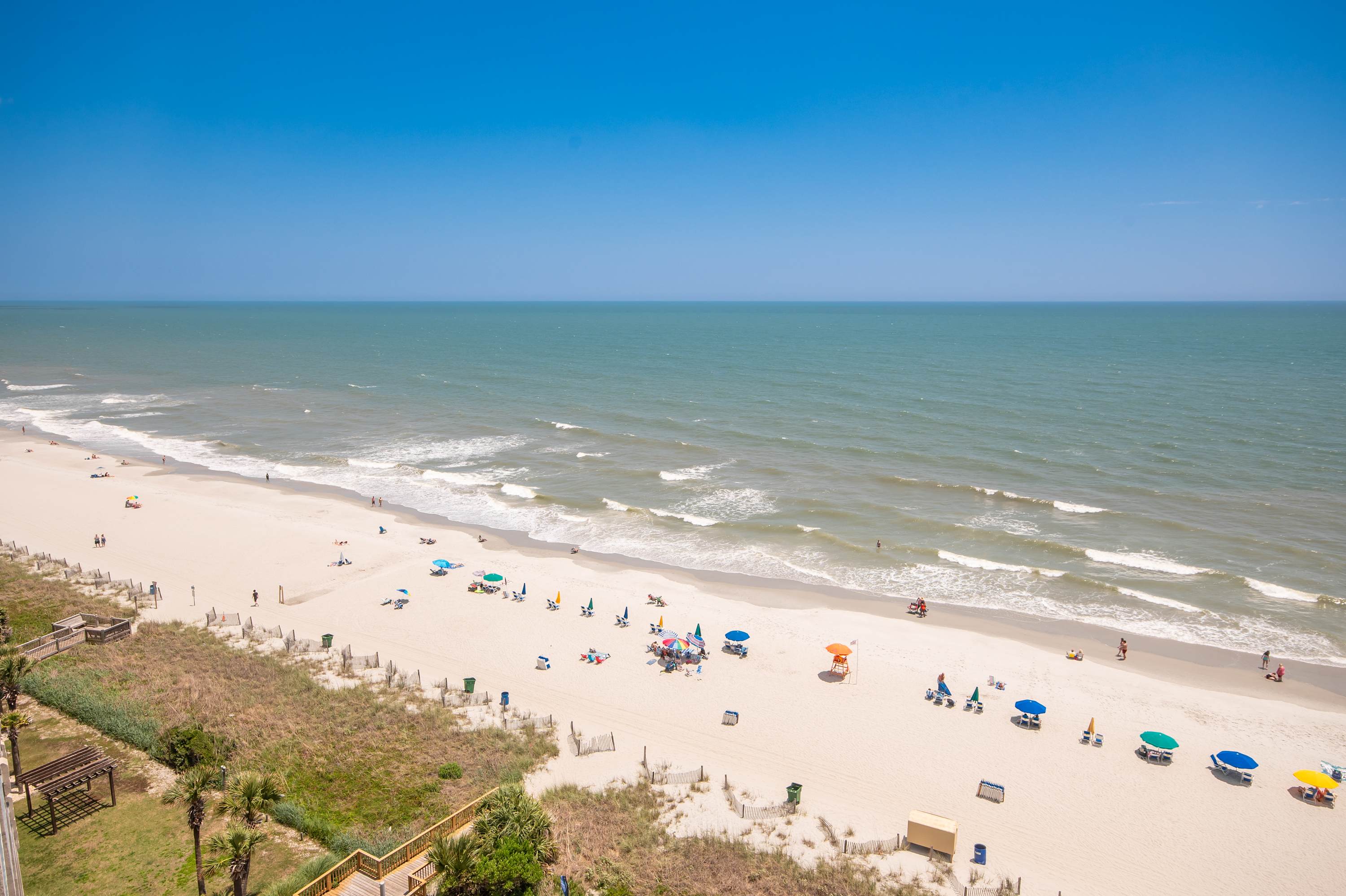 Enjoy the soundtrack of crashing waves while you relax above the shore.
