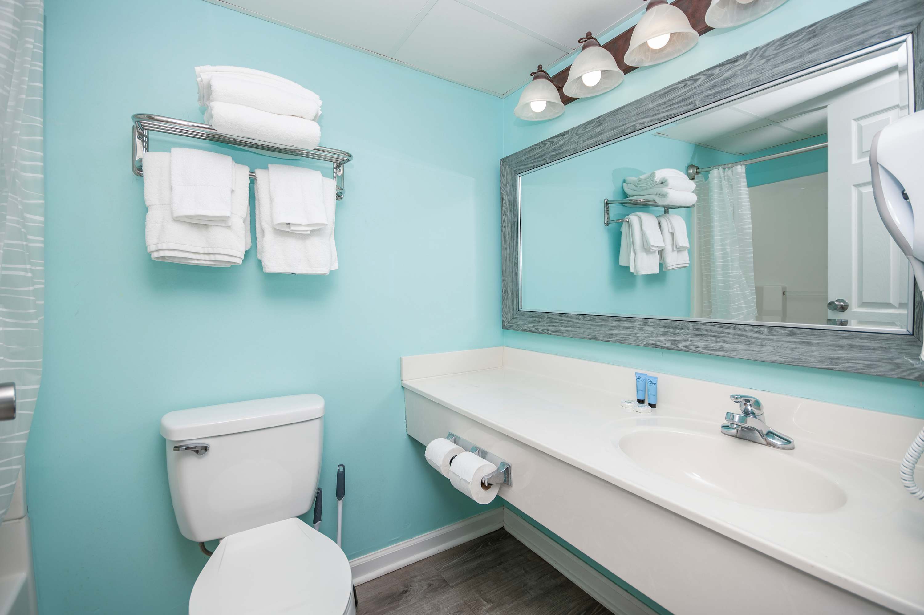 Clean, crisp, and refreshingly modern—everything you want in a vacation bathroom.
