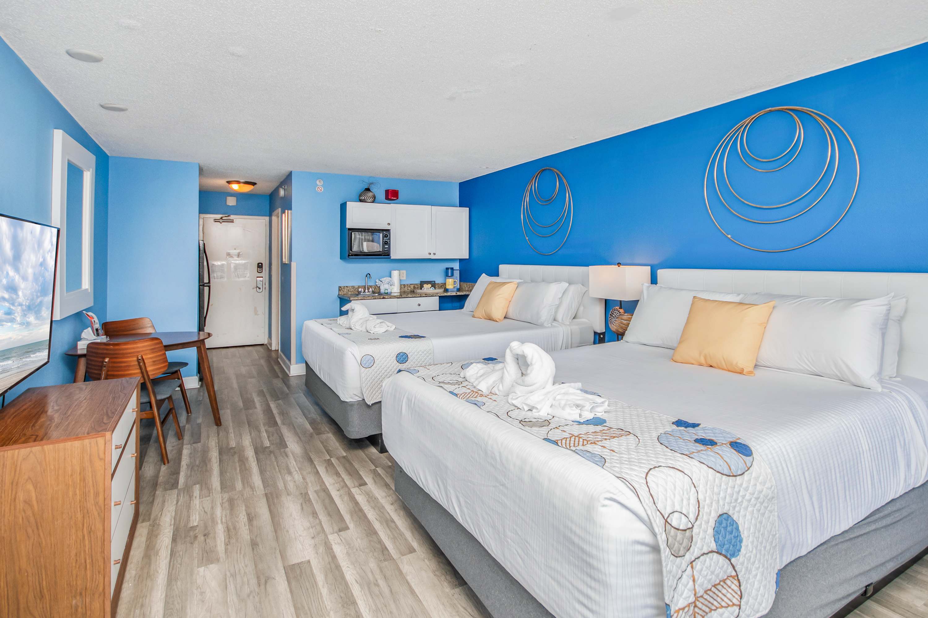 Beachside dreams start here—sink into luxury pillows after a day on the sand.
