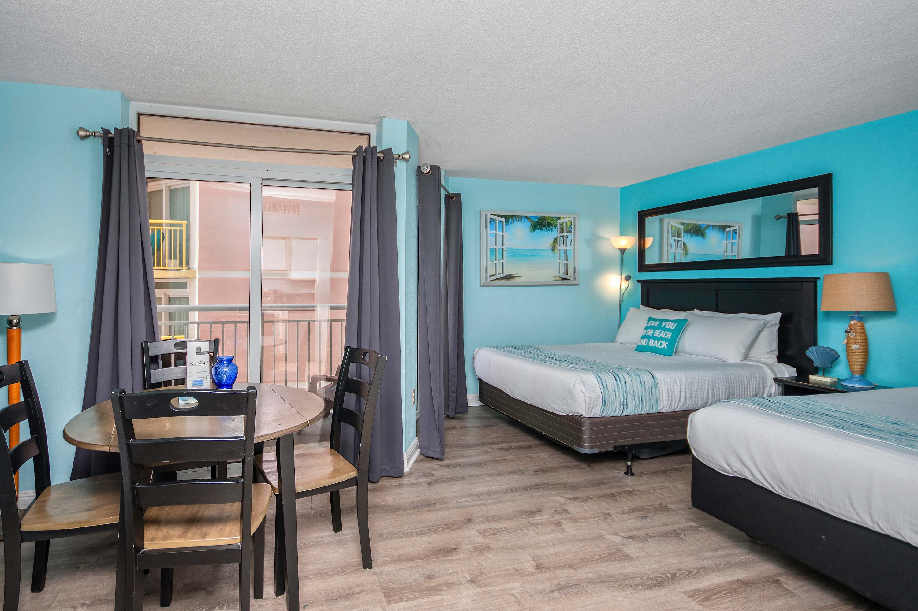 Relax and unwind in this tranquil space, complete with blackout curtains and soft bedside lighting.