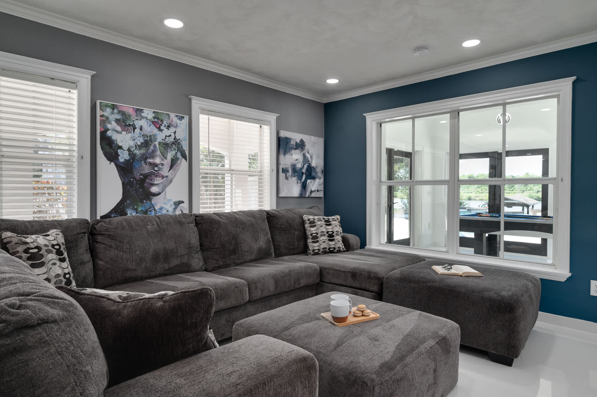 Cozy evenings and bright mornings in this inviting living space, with views overlooking the gameroom