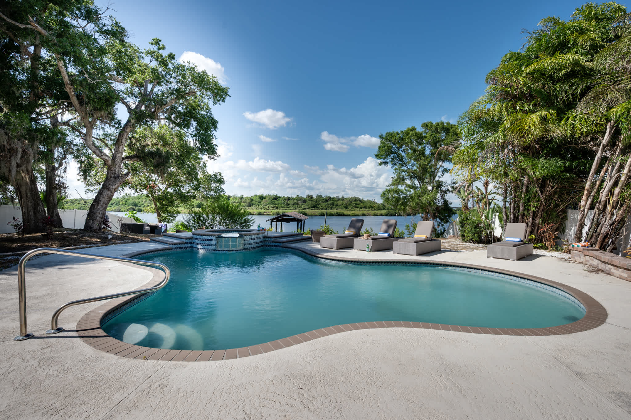Indulge in a peaceful moment in our beautiful spa, overlooking the serene waterfront.