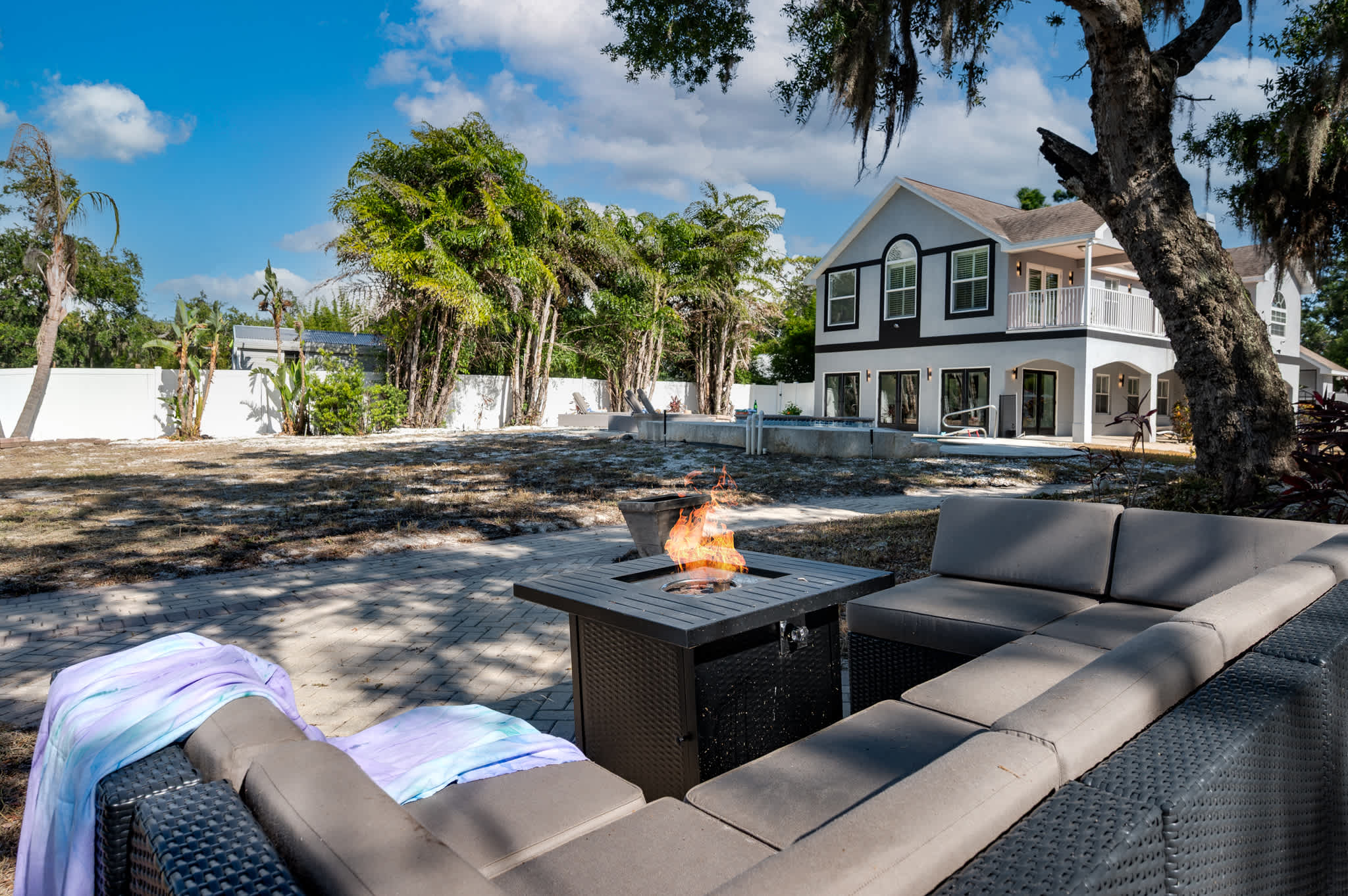 Evenings are magical here! Gather around the fire pit and enjoy stunning sunsets by your private pool and spa.