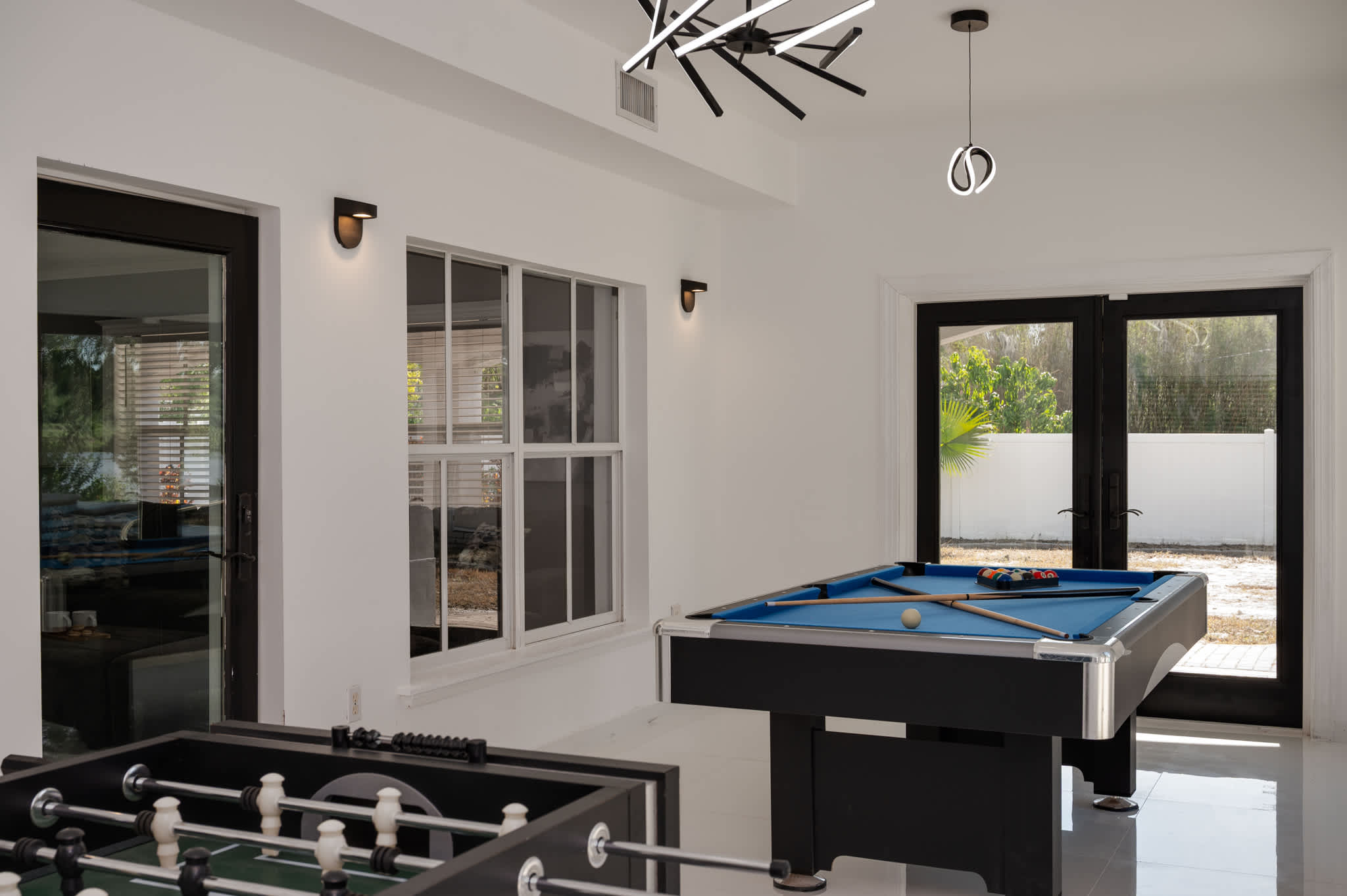 Endless entertainment awaits! Our dedicated game room is equipped with a pool table and foosball for hours of fun.