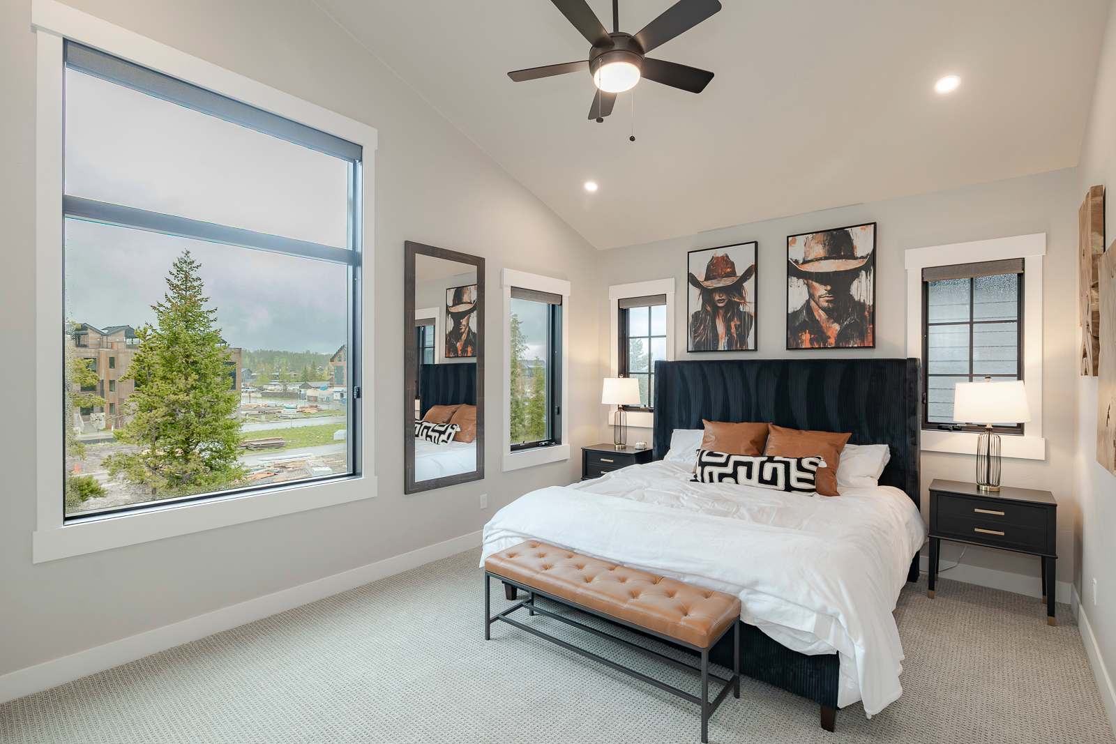 - Retreat to this cozy and stylish bedroom, a peaceful haven designed for restful nights and serene mornings. The perfect spot to recharge with a view of the surrounding nature before your next adventure.
