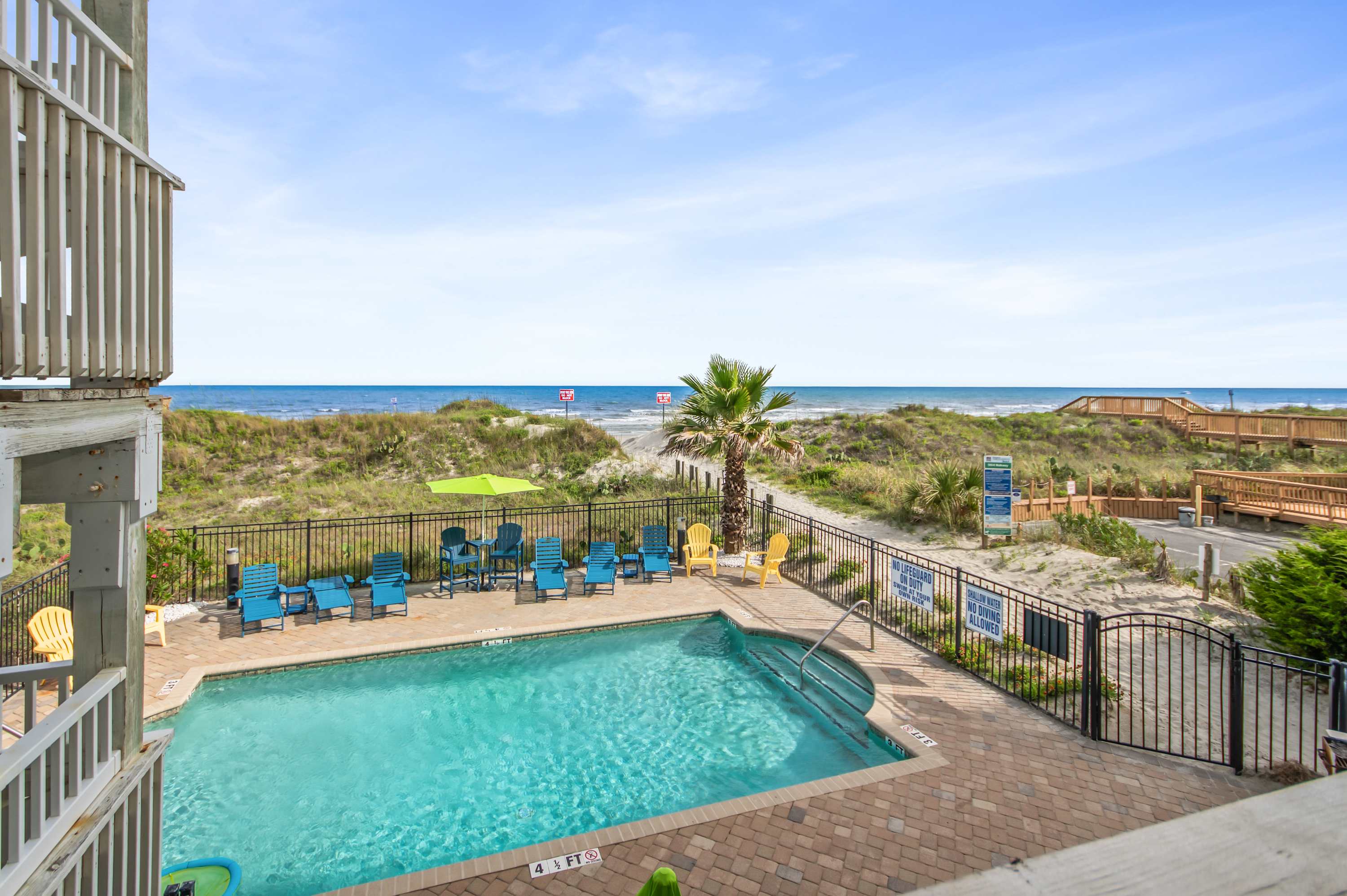 Sip coffee with a serene pool view and the sounds of vacation all around.
