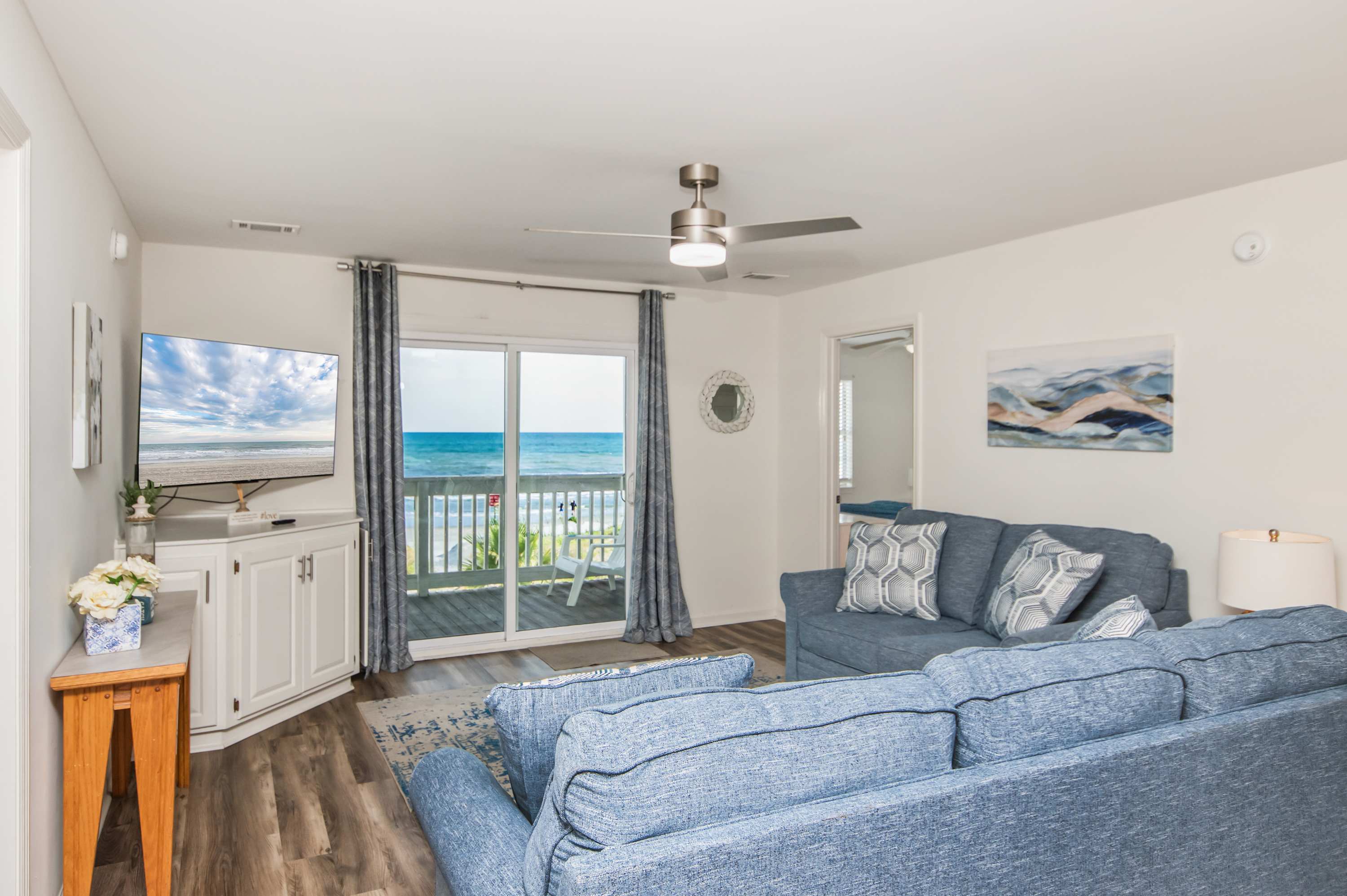 Kick back in a cozy, coastal living room made for relaxation.
