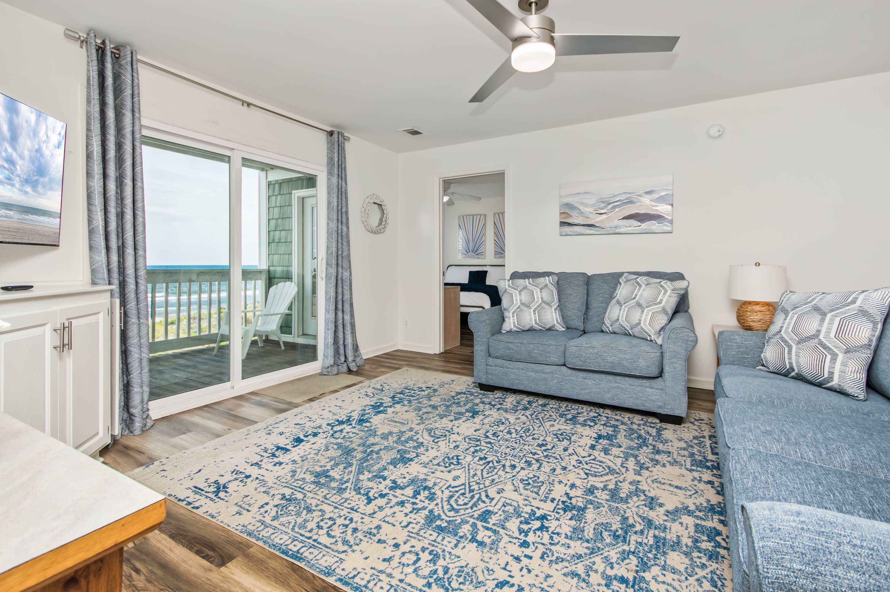 Kick back in a cozy, coastal living room made for relaxation.
