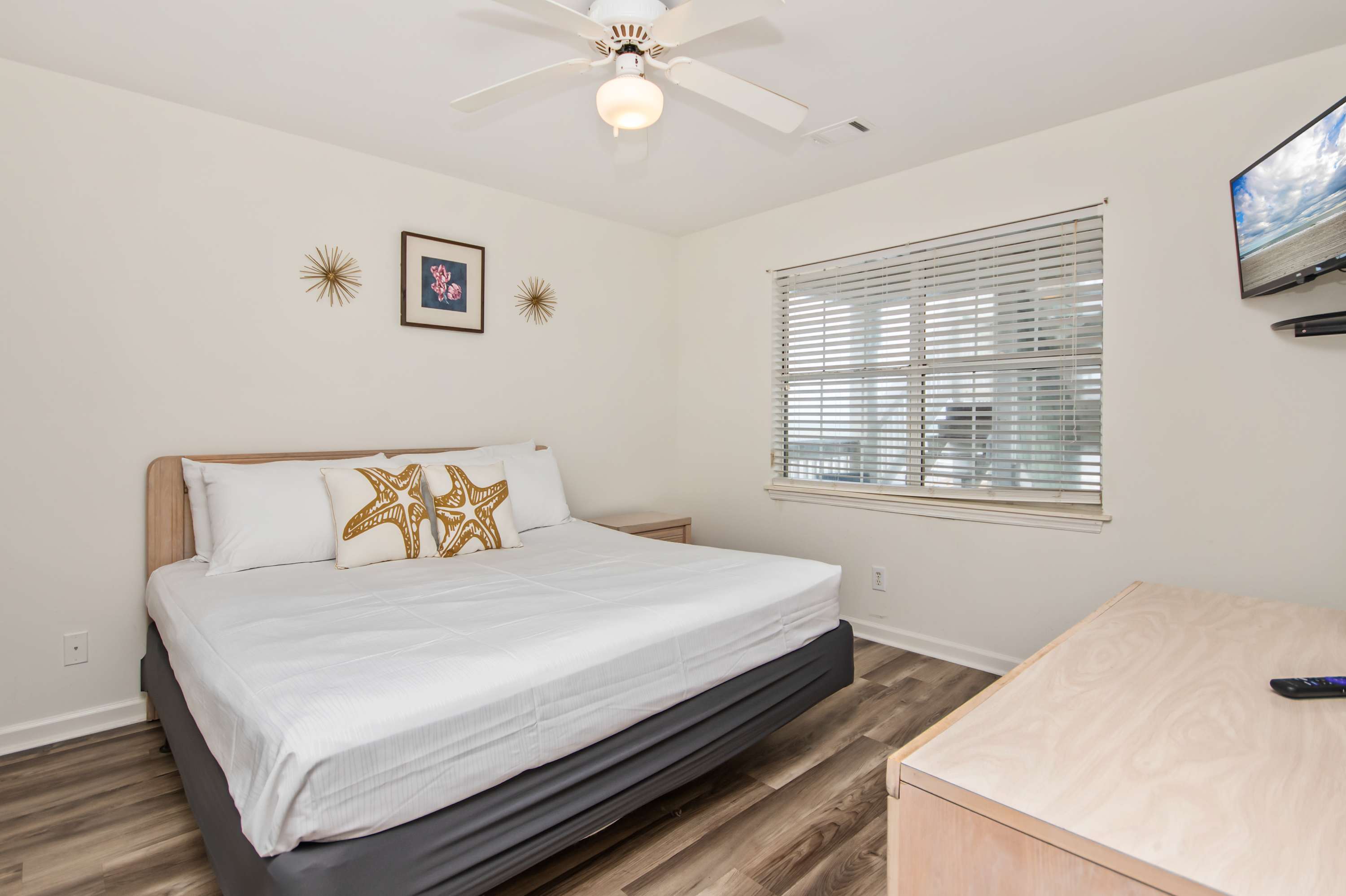 Simplicity meets comfort in this peaceful coastal-inspired bedroom.
