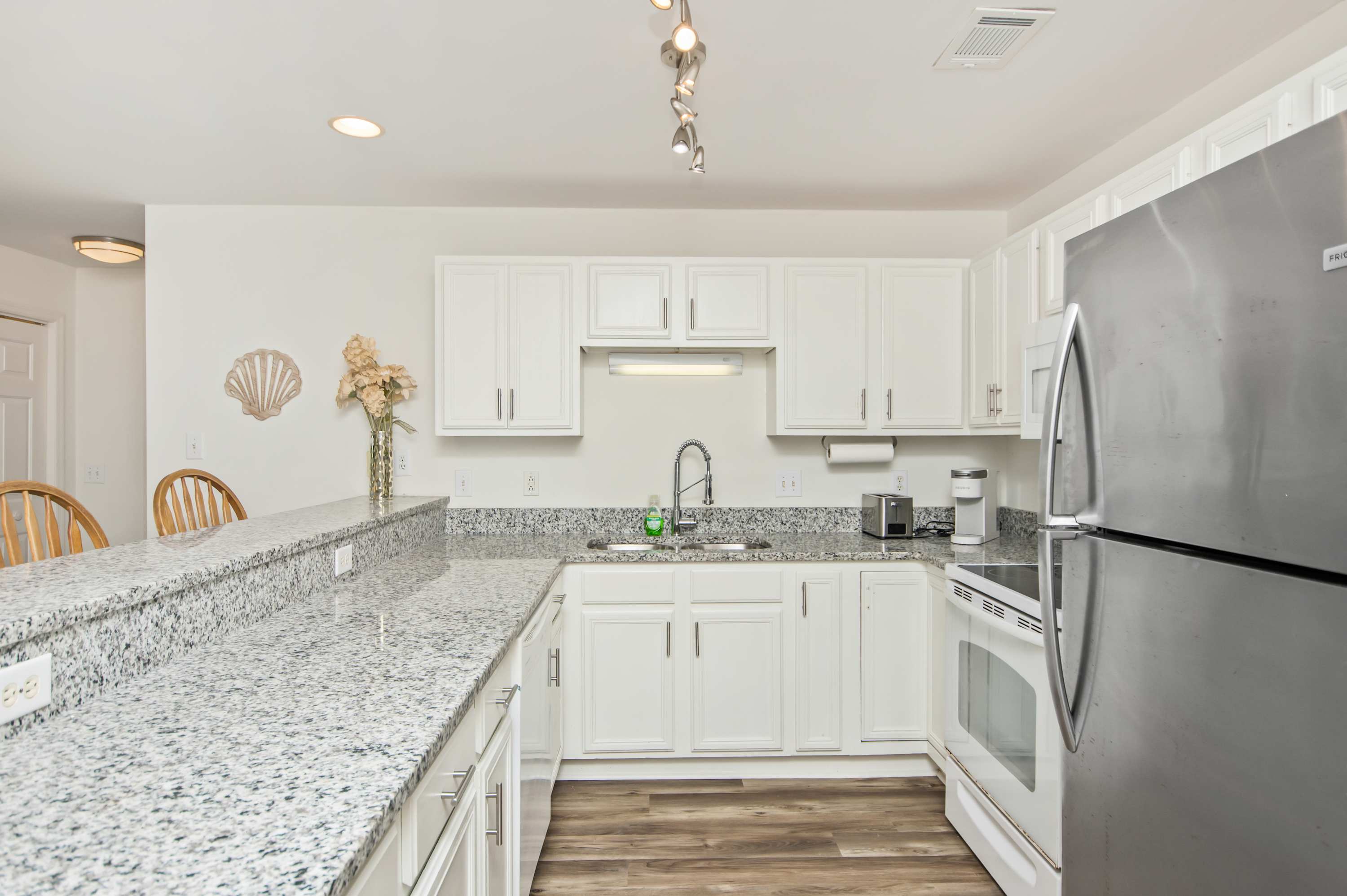 A modern kitchen that lets you cook like you never left home.
