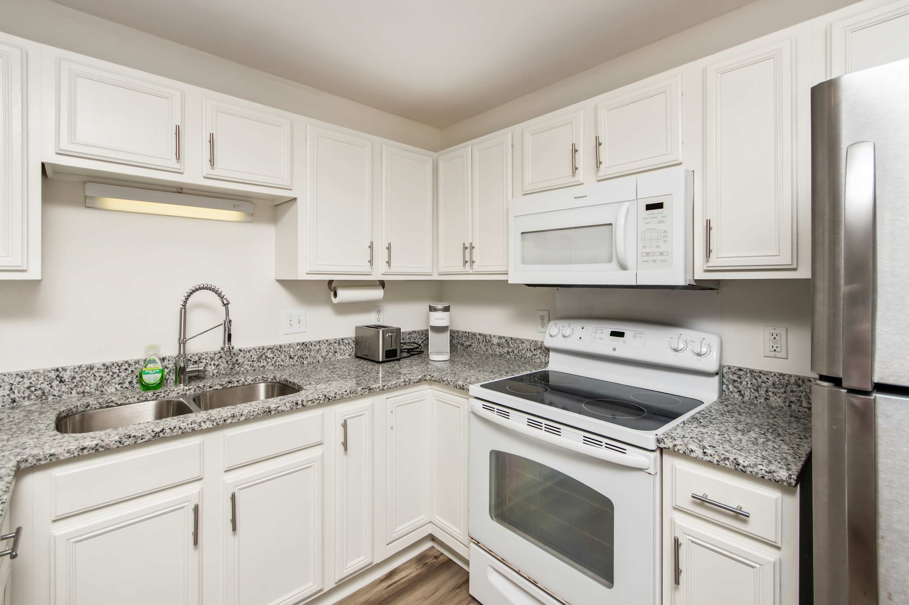 A modern kitchen that lets you cook like you never left home.
