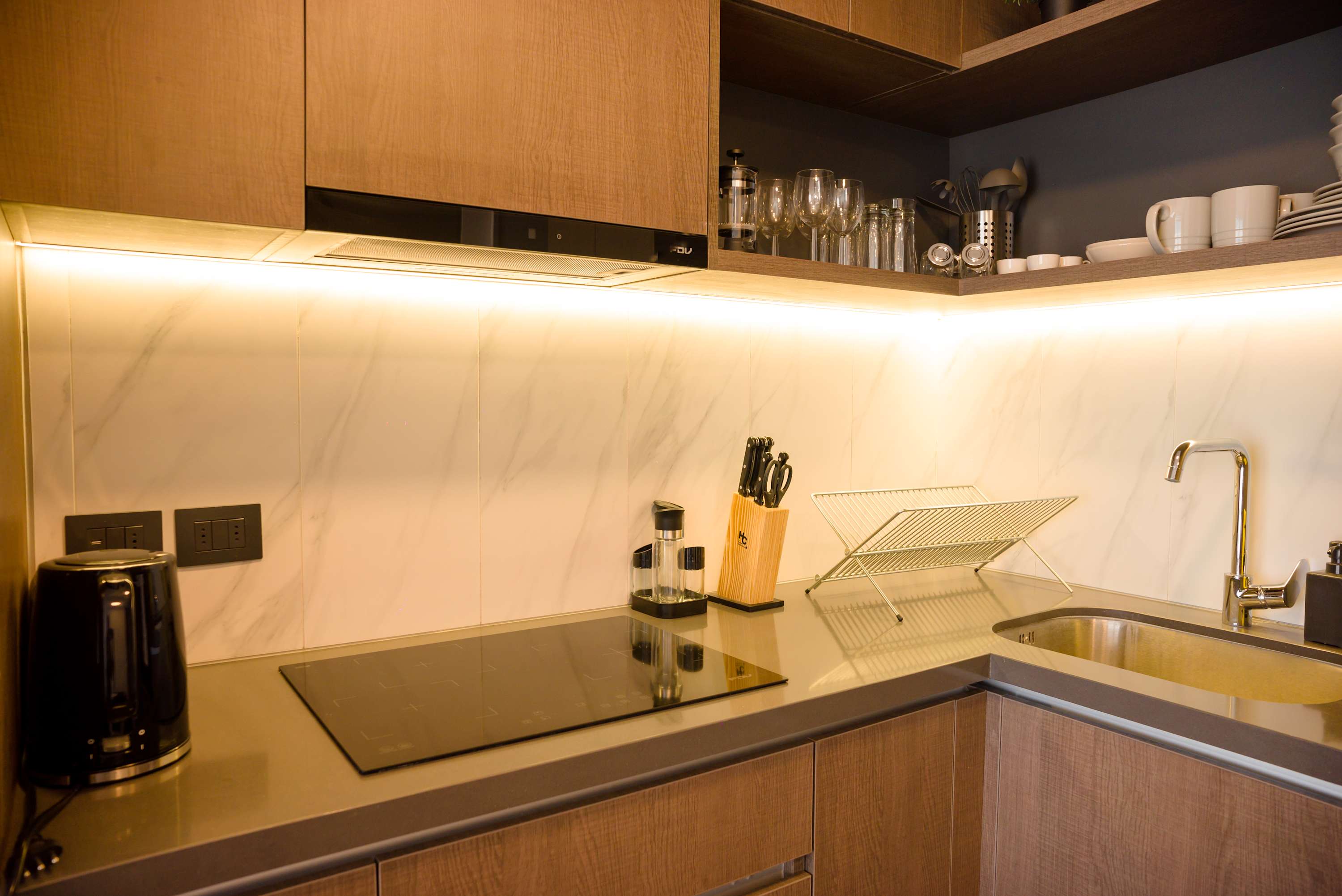 Sleek and modern kitchen with top-notch amenities, perfect for culinary enthusiasts.
