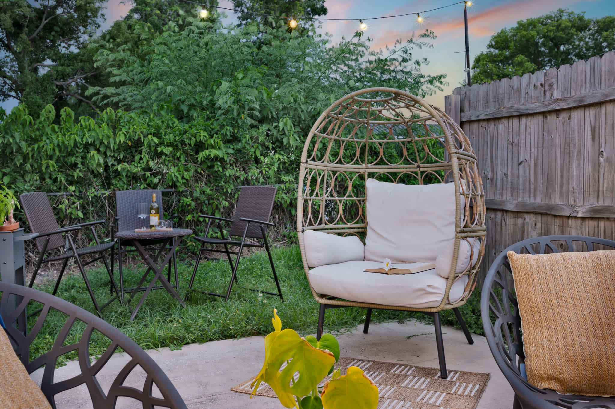 Step outside to your inviting private patio, offering comfortable seating and a delightful atmosphere for relaxation and conversation.