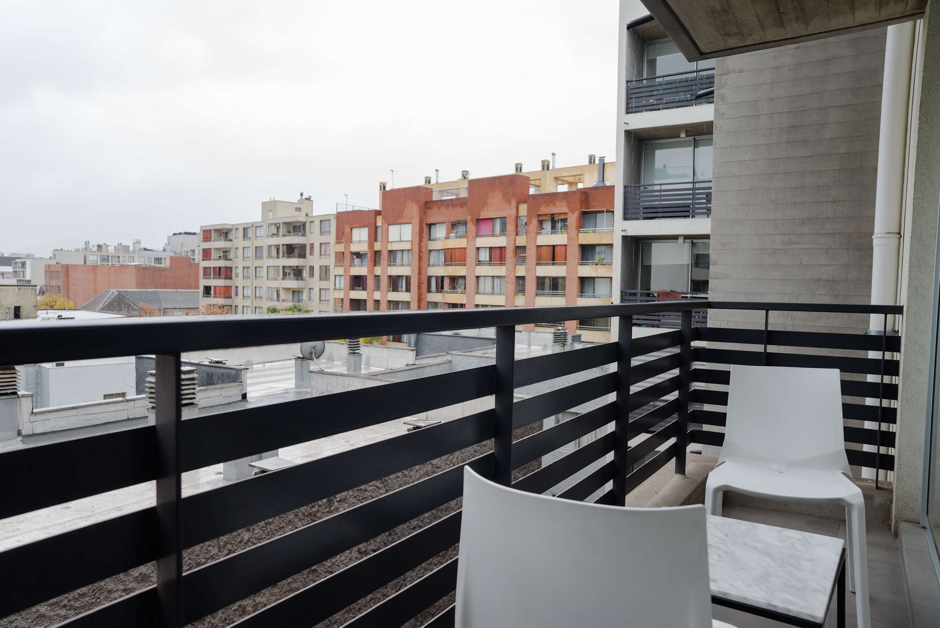 Relax on your private balcony with city views, perfect for morning coffee or evening unwinding.