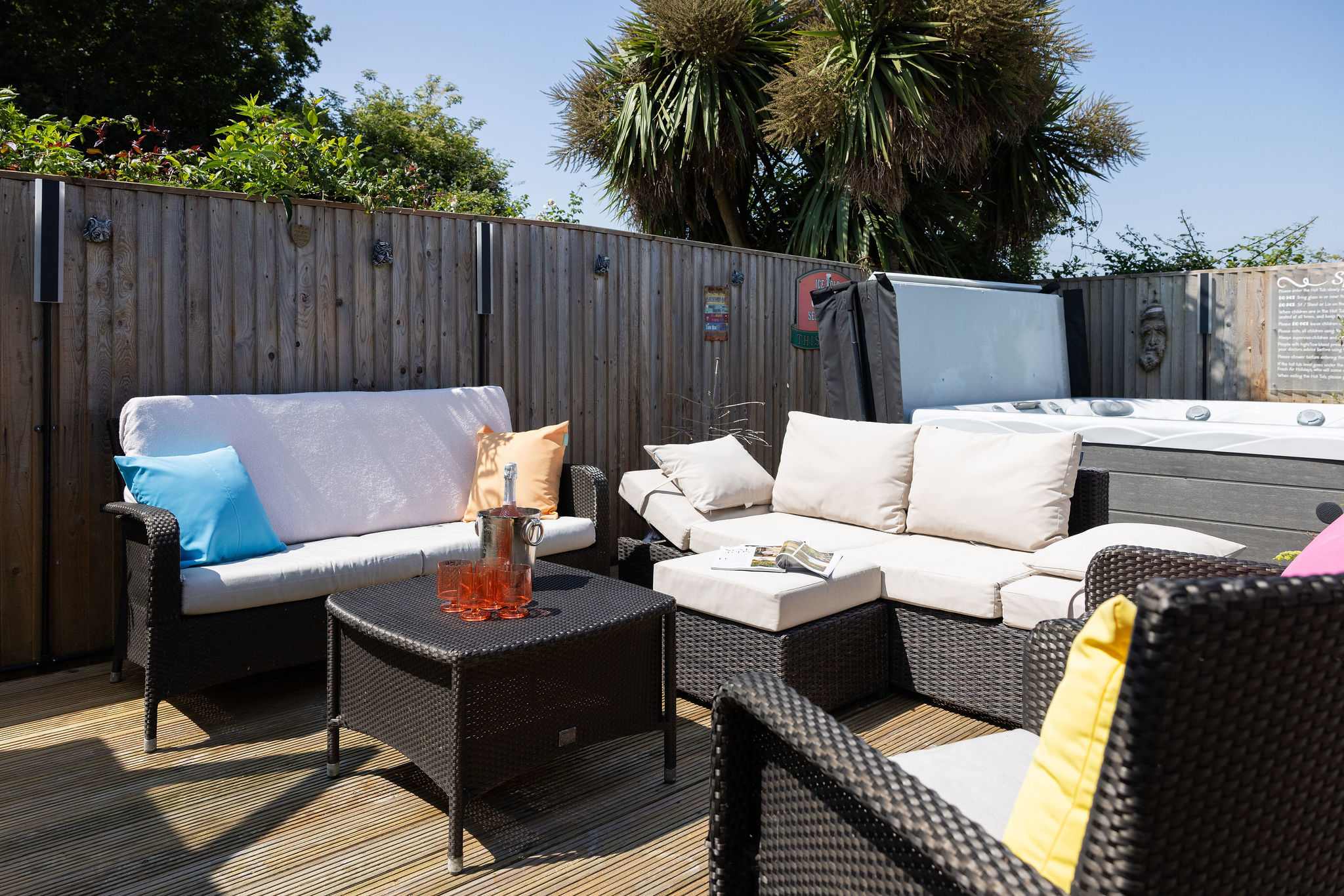 Hot tub and comfy seating in the sun