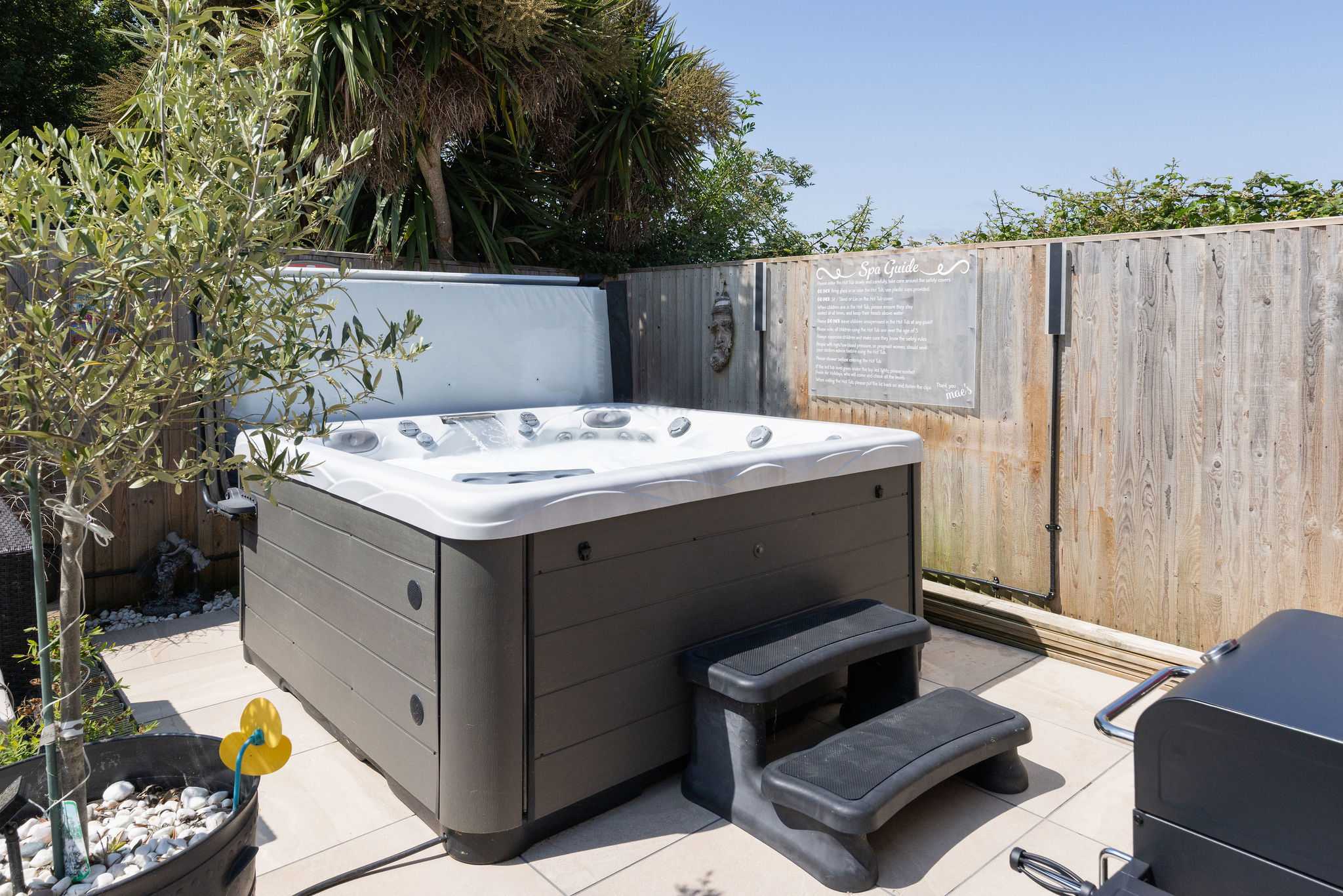 Soak and unwind in the 4-person hot tub