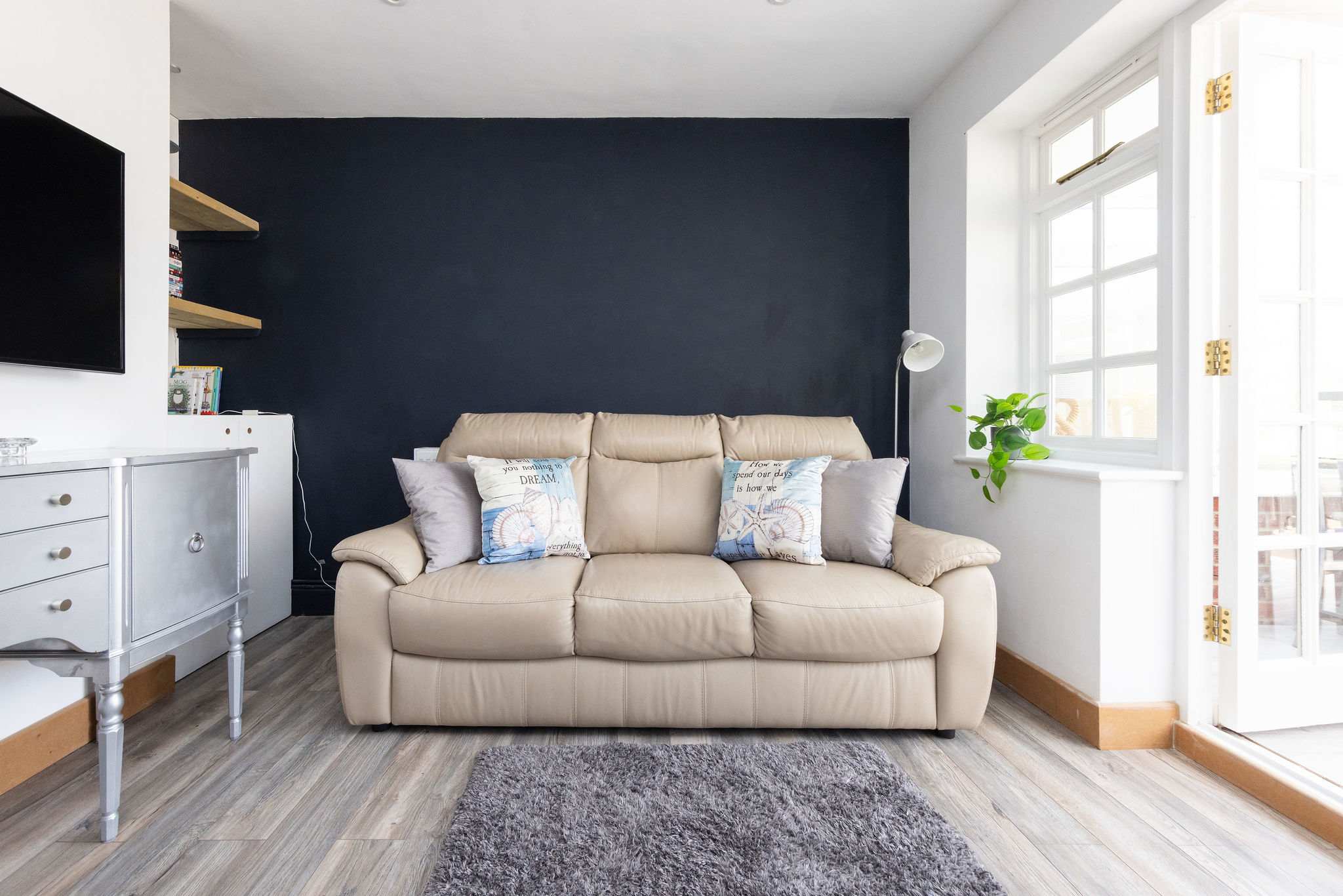 Stylish seating with smart TV and calming tones