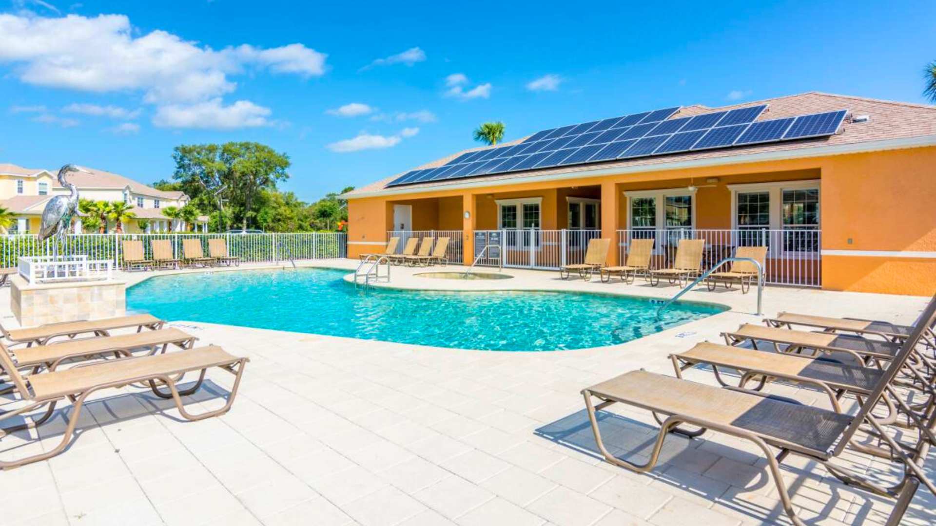 Resort Outdoor Community Pool with Sun Loungers