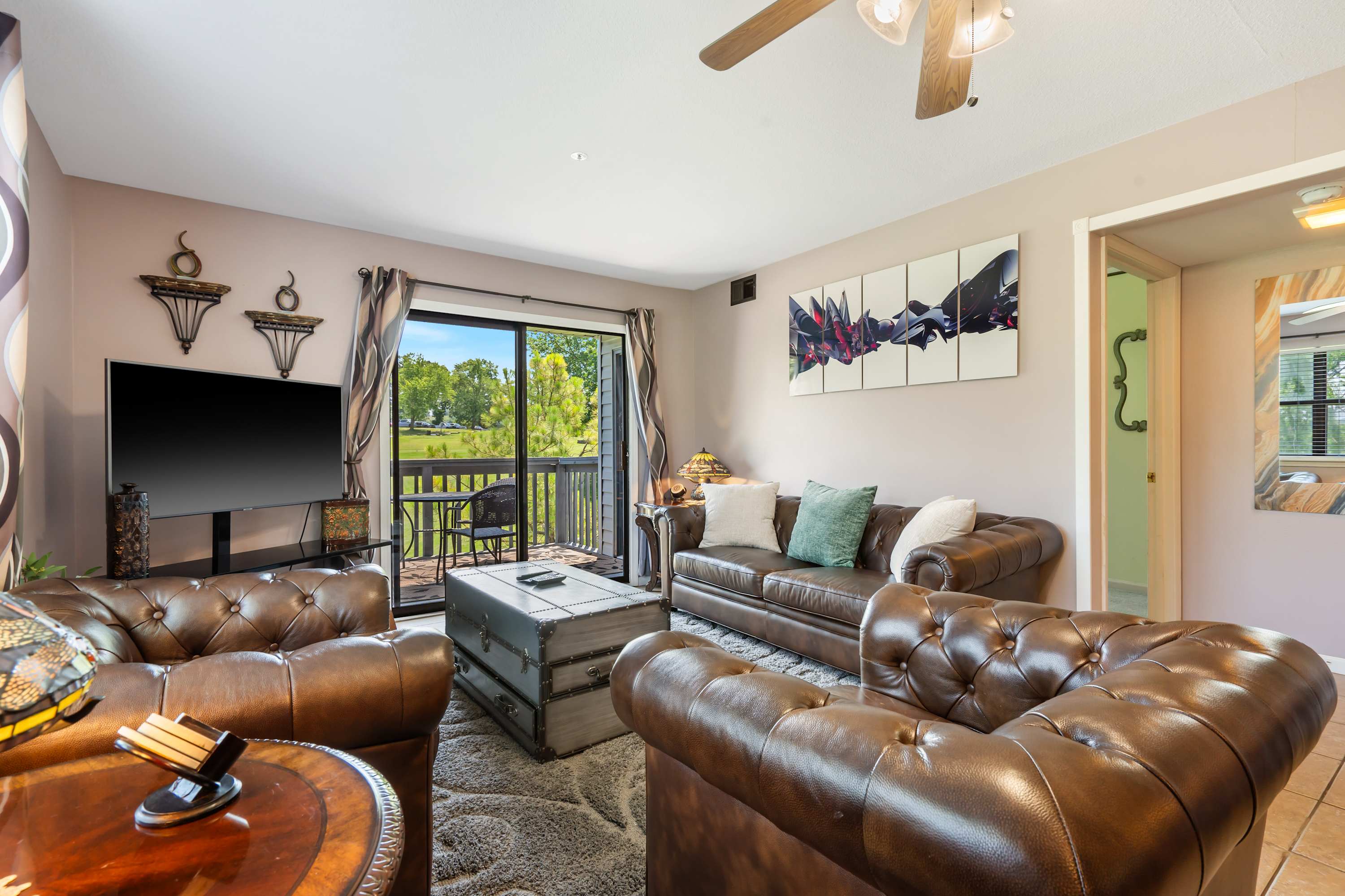 Curl up in the inviting living room & stream your favorites on the smart TV​