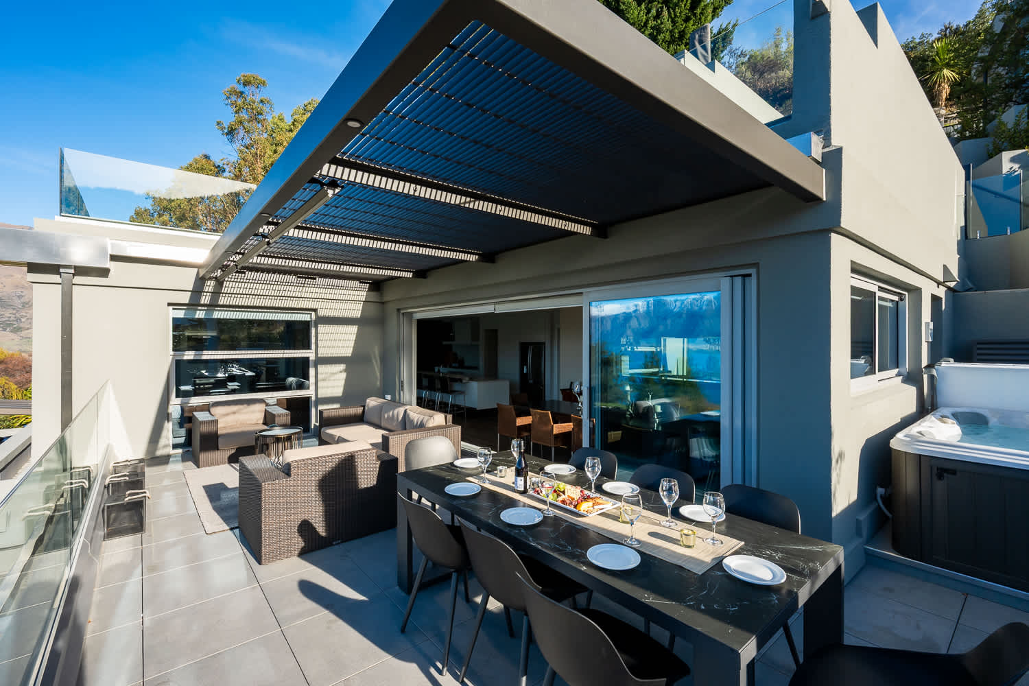 The open-plan kitchen flows effortlessly into the dining and living areas, making entertaining simple. With everything you need just steps away, meal prep becomes a pleasure.