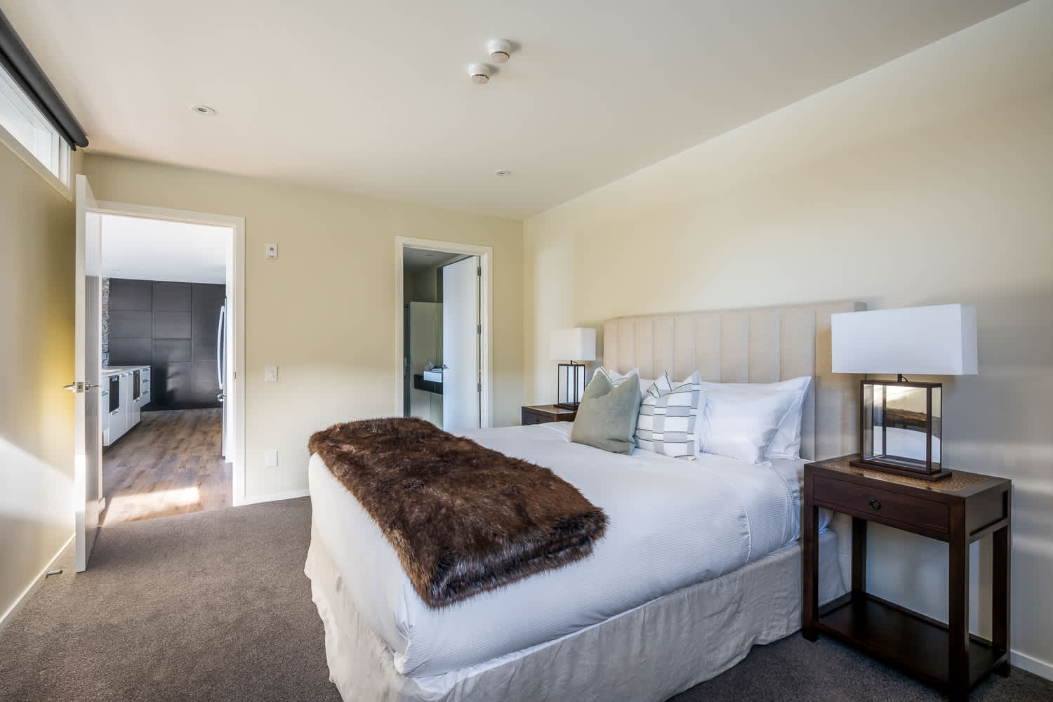 Ideal for family or friends, the third bedroom provides a welcoming space with ample storage. Enjoy quiet mornings and relaxing evenings in this charming room.