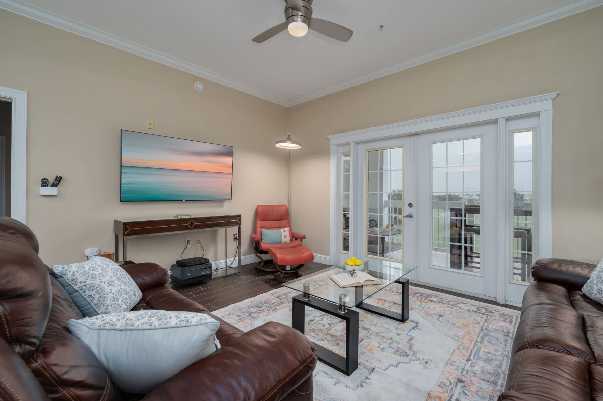 Relax in comfort in our inviting living area, complete with plush seating and direct access to your private balcony overlooking scenic views.