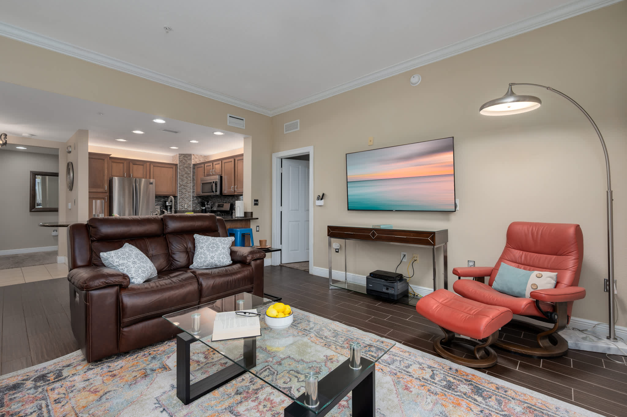 Bright and stylish living space, perfect for unwinding after a day of adventures, with an open layout leading to the well-appointed kitchen