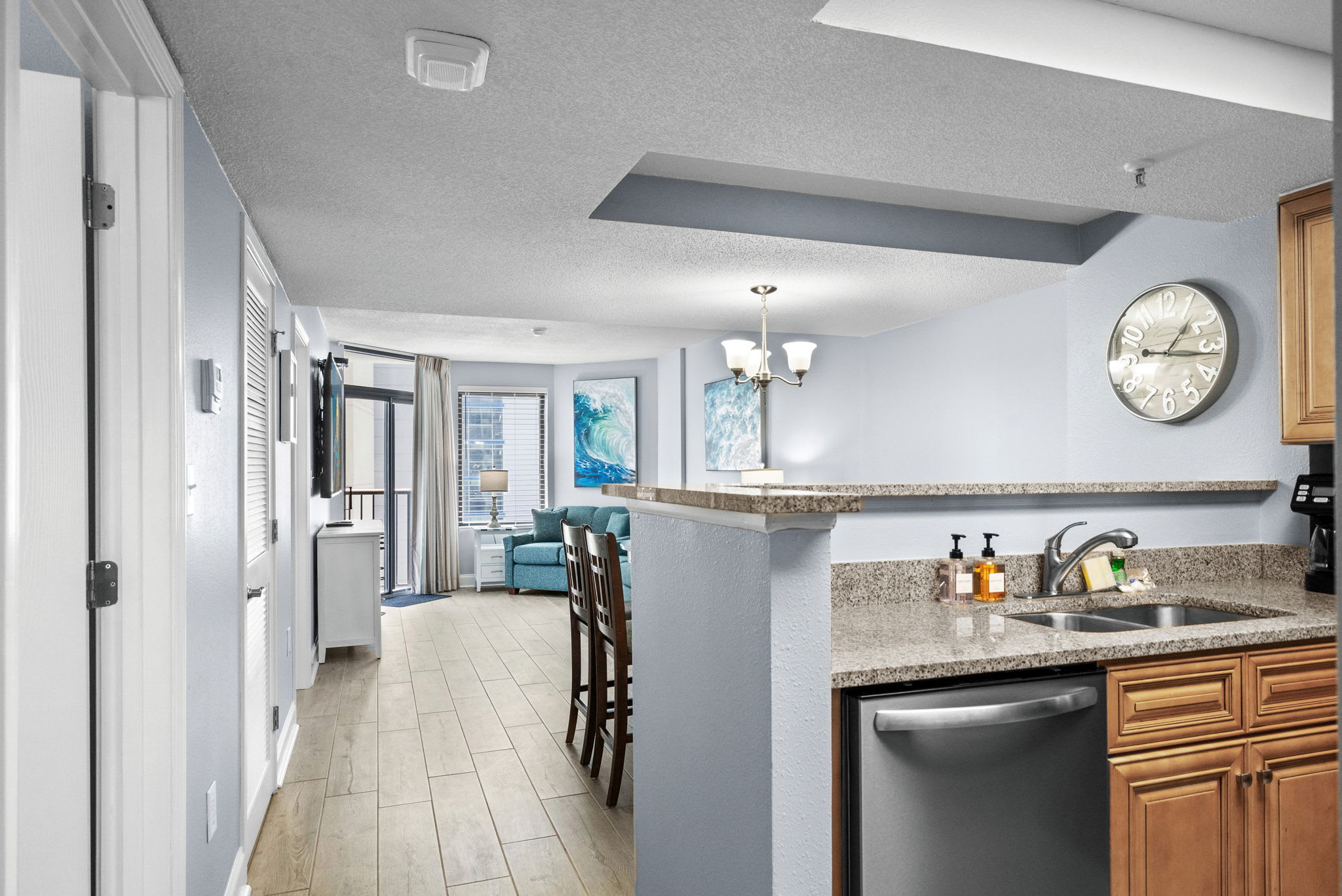 Kitchen perspective overlooking the living space.