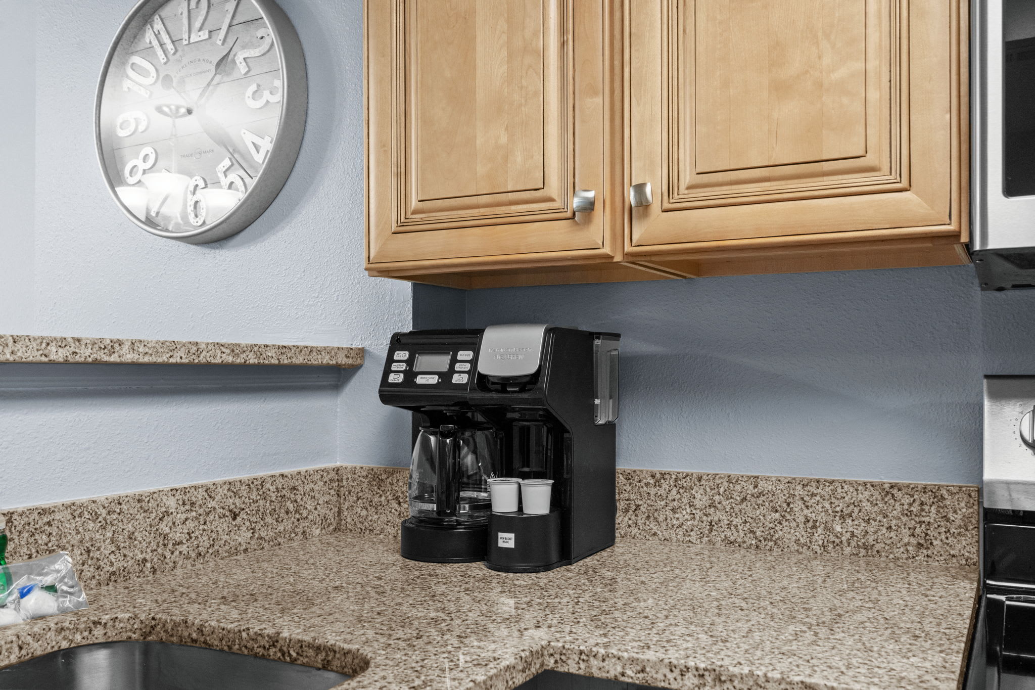 Drip and Keurig coffee machines side by side.