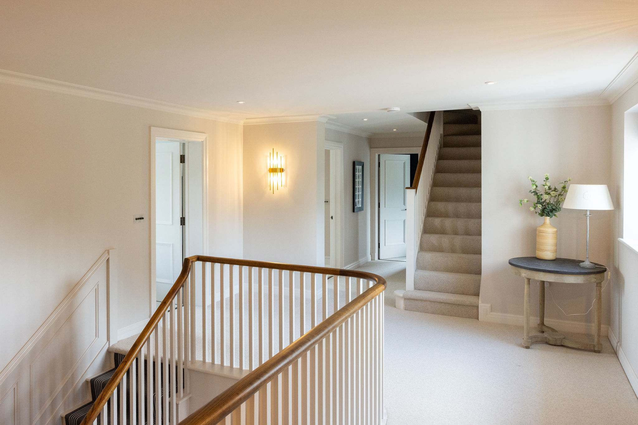 Spacious landing leading to five stylish bedrooms