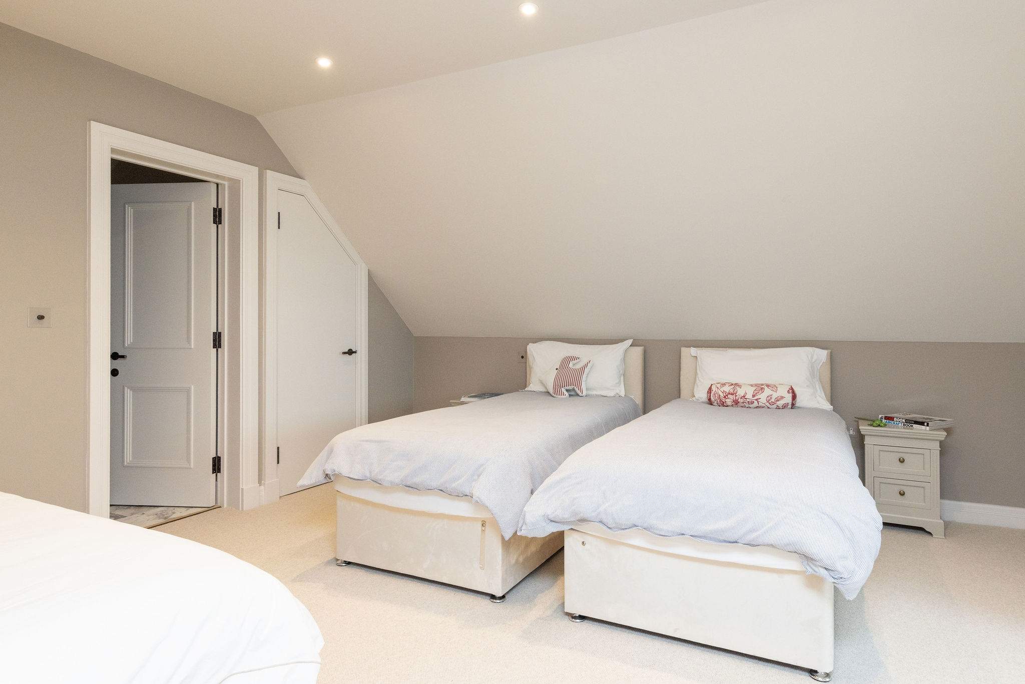 Bright room with three single beds and en suite