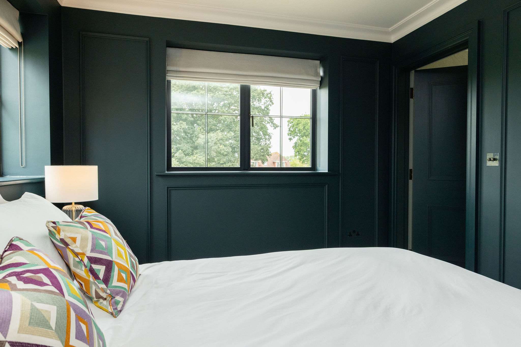 Peaceful outlook from this bold and elegant bedroom