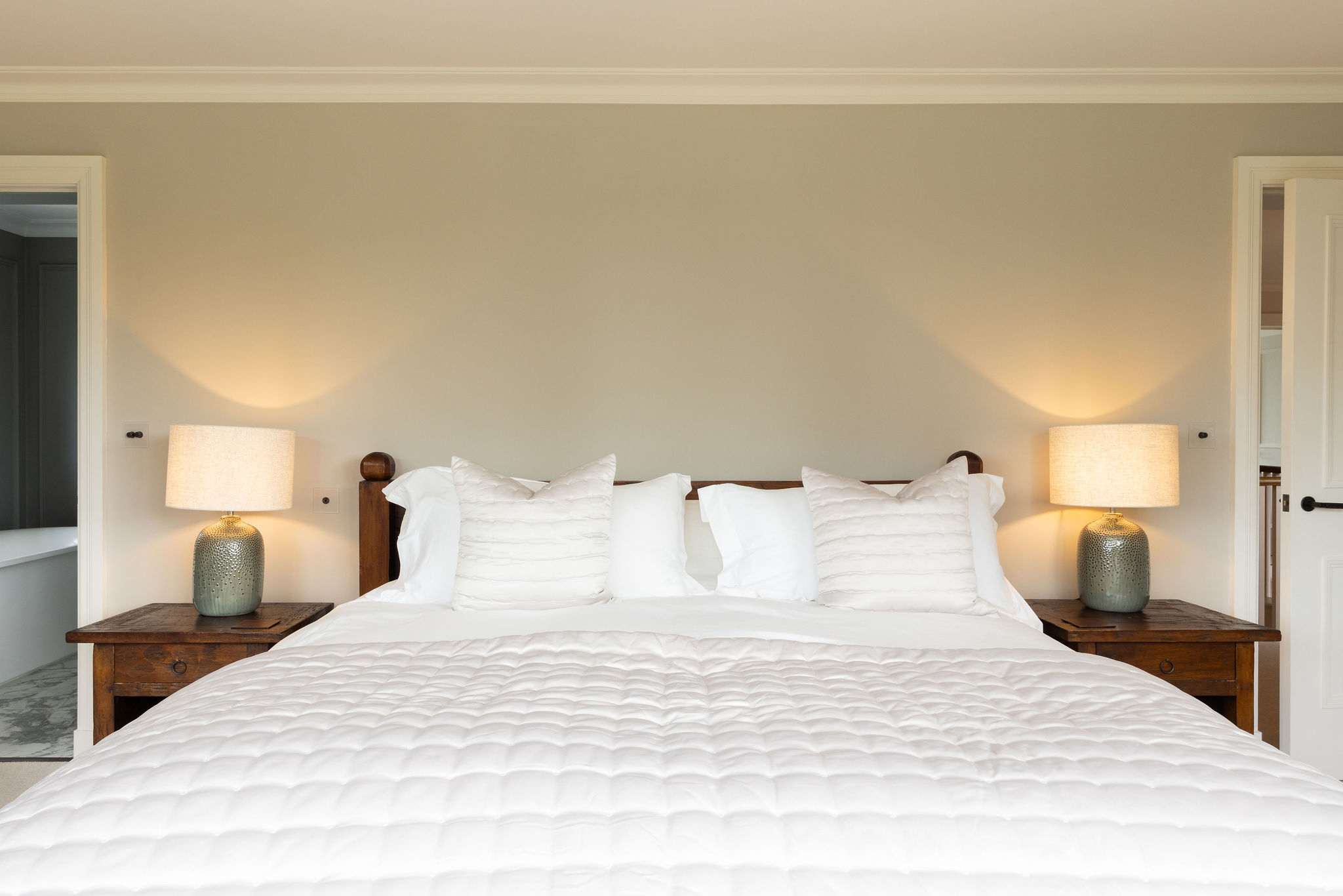 Calming bedroom with super king bed and crisp white bedding