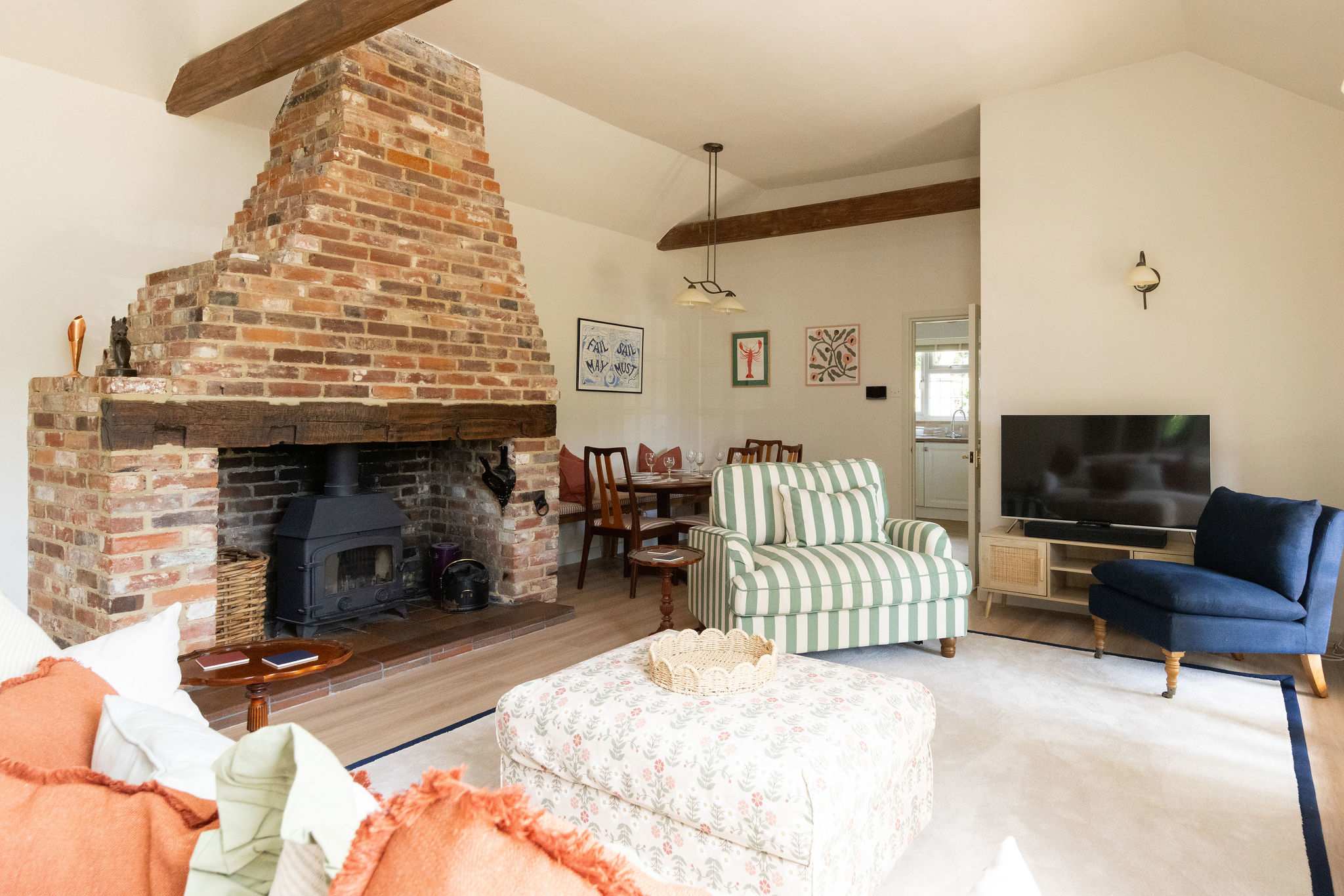 The home has a cosy, characterful lounge, with log burner to light on cooler nights.