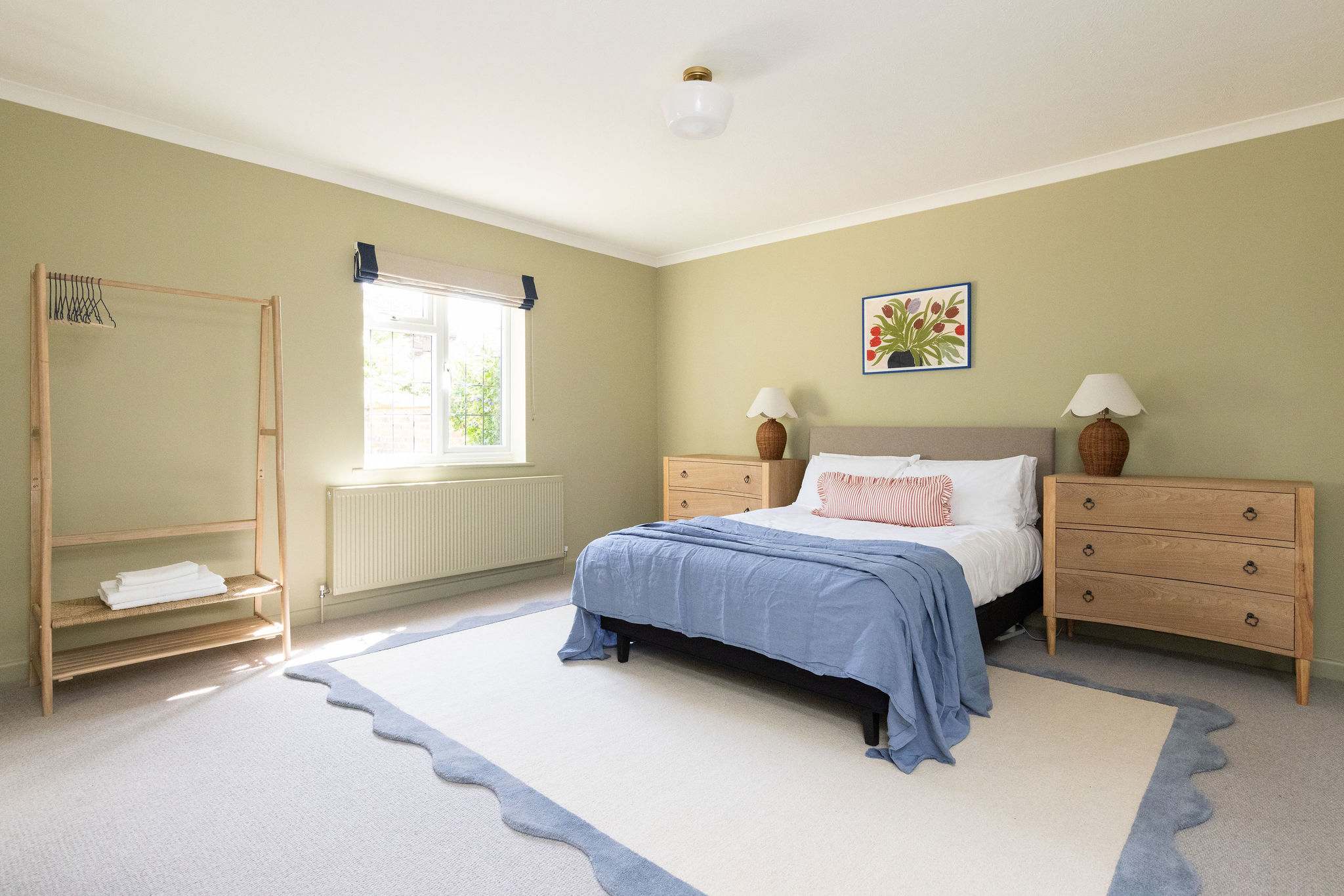 The master bedroom is spacious, with plenty of draws and hanging space for your belongings.