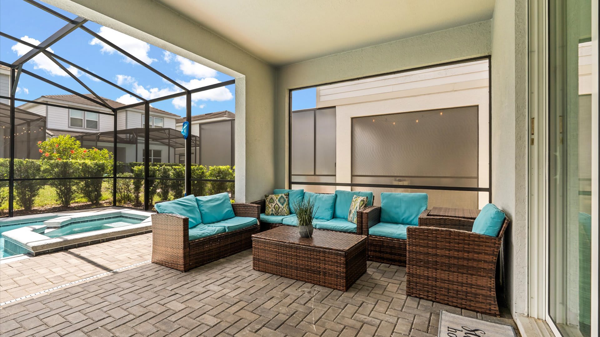 Comfortable outdoor lounge with cushioned seating, perfect for morning coffee or evening cocktails by the pool.