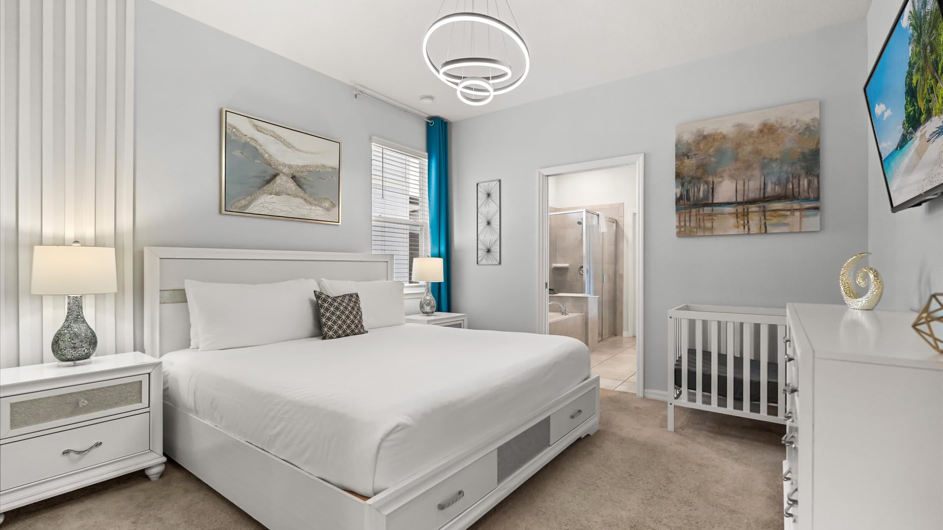 Elegant master suite with a king bed, Smart TV, and en-suite bathroom. A peaceful retreat for recharging between adventures.