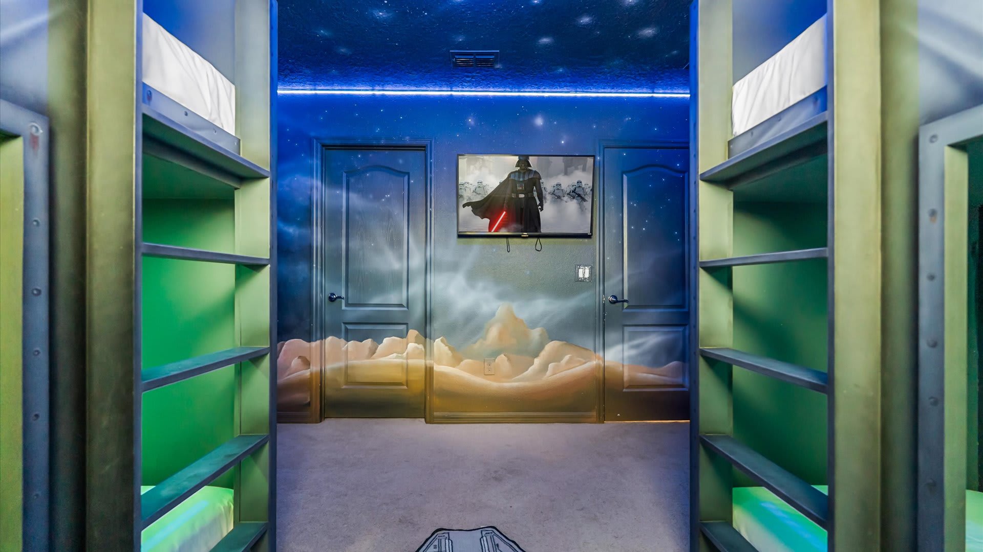 Star Wars Themed Bedroom with Bunk Beds | Each bedroom brings a beloved story to life with custom murals, themed décor, and comfy bedding. A magical space for kids (and kids-at-heart) to dream big.