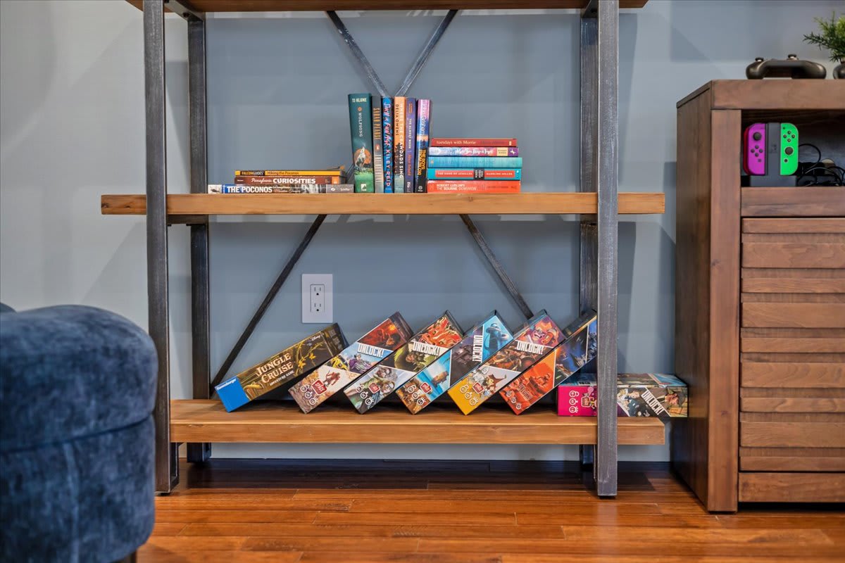 Rustic Wood-Paneled Den with Vintage Charm and Natural Light
