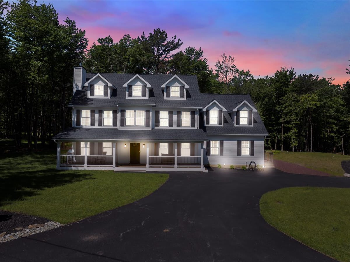 Stunning Twilight View of The Happy House Exterior