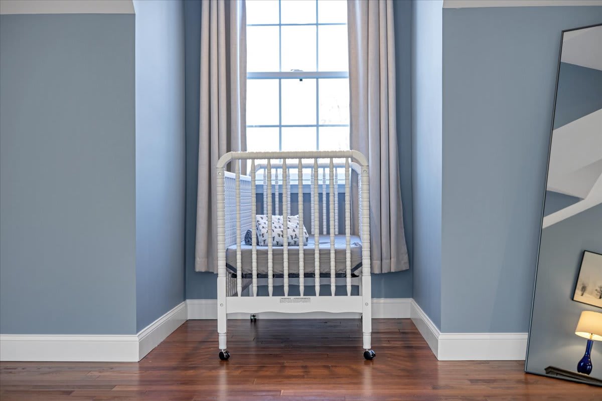 Nursery Corner with Stylish White Crib