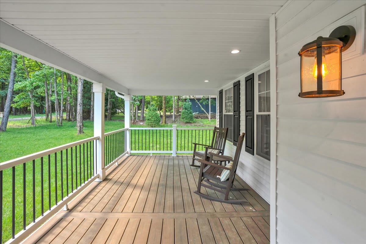 Evening Deck View with Ambient Lighting and Nature Views